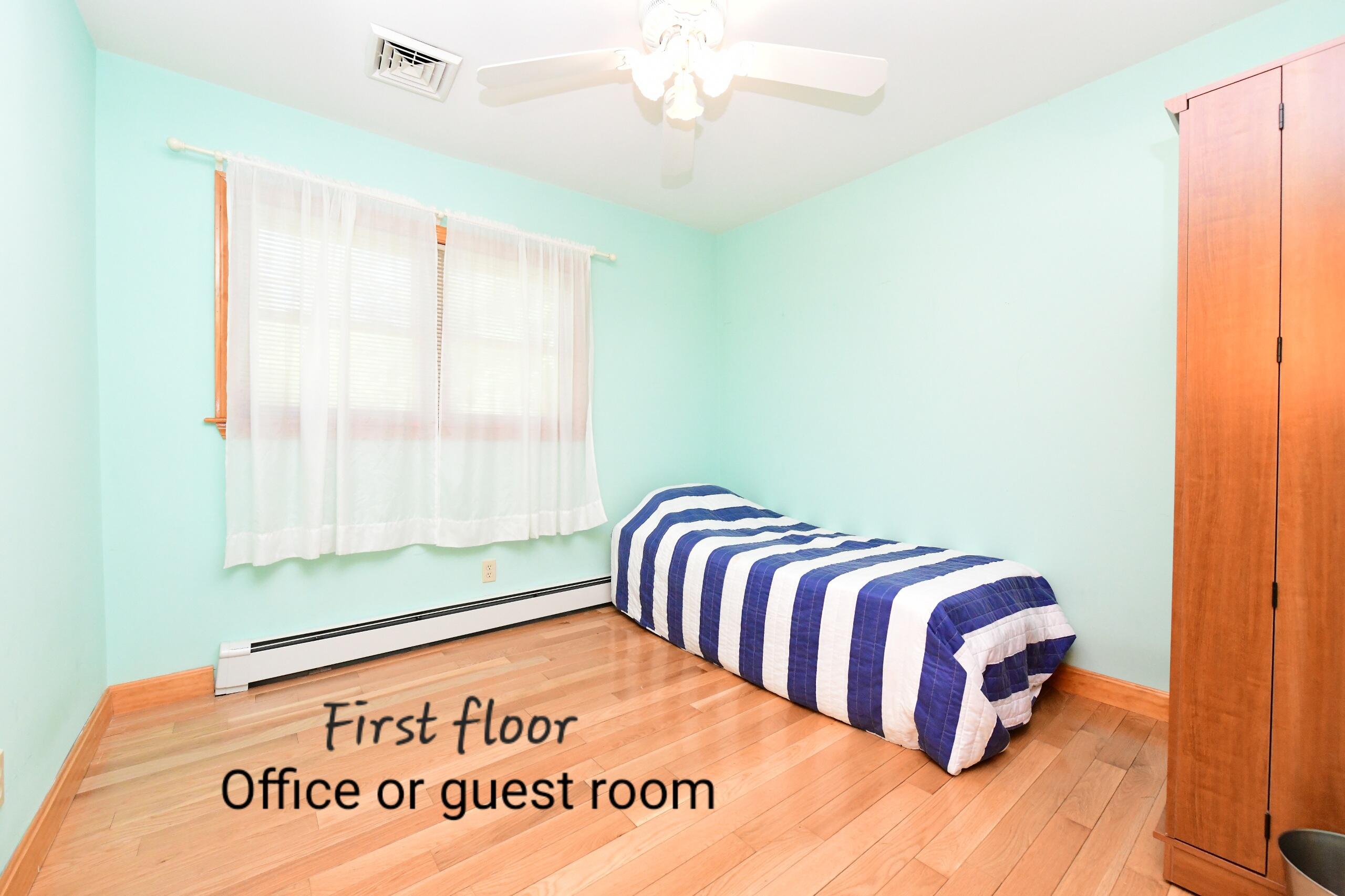 173 Standish Road Sagamore Beach, MA 02562 - Photo 15 of 39 a bedroom with a bed and a window