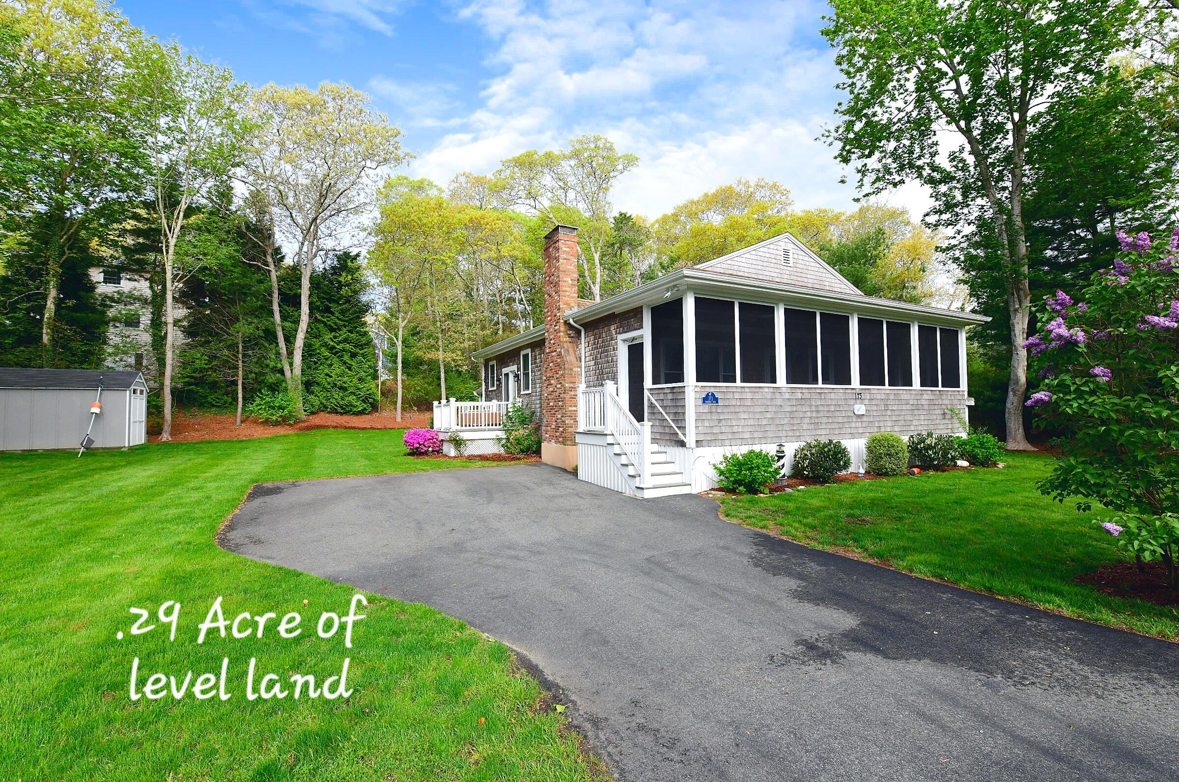 173 Standish Road Sagamore Beach, MA 02562 - Photo 2 of 39 a view of a house with a yard