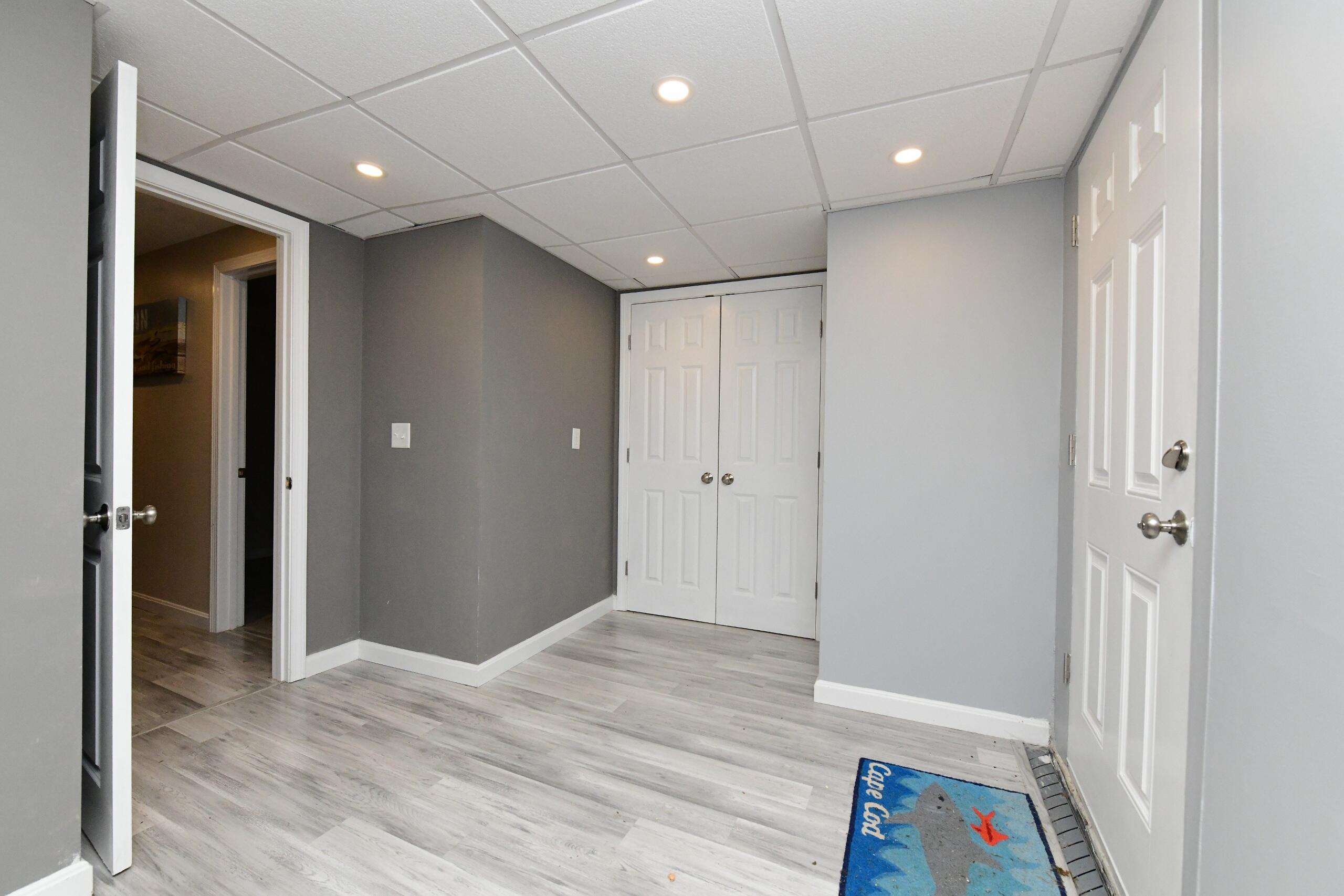 173 Standish Road Sagamore Beach, MA 02562 - Photo 24 of 39 a view of hallway with a hallway and wooden floor