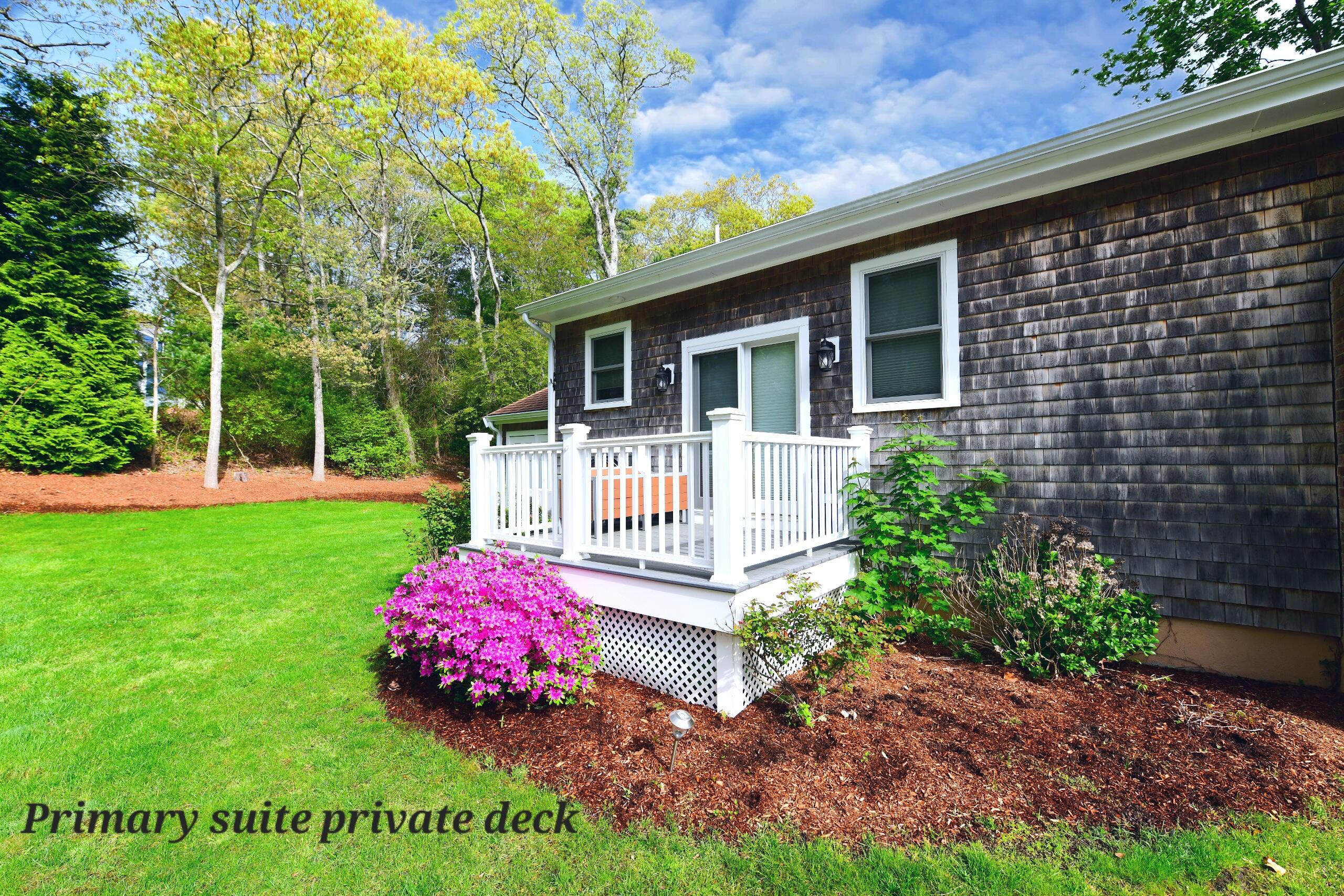 173 Standish Road Sagamore Beach, MA 02562 - Photo 30 of 39 a front view of a house with garden