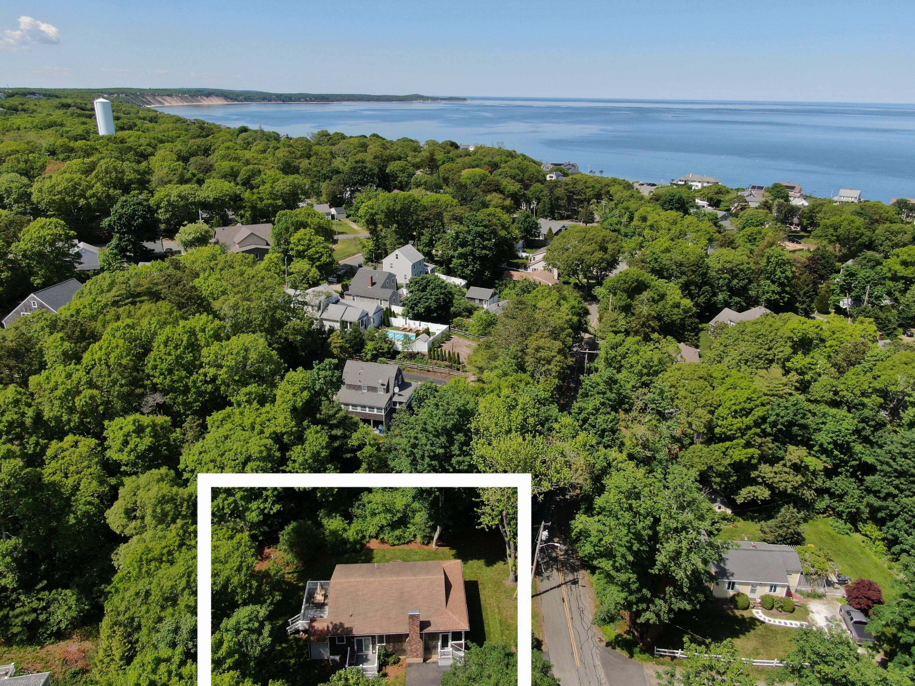 173 Standish Road Sagamore Beach, MA 02562 - Photo 3 of 39 an aerial view of a house with a yard