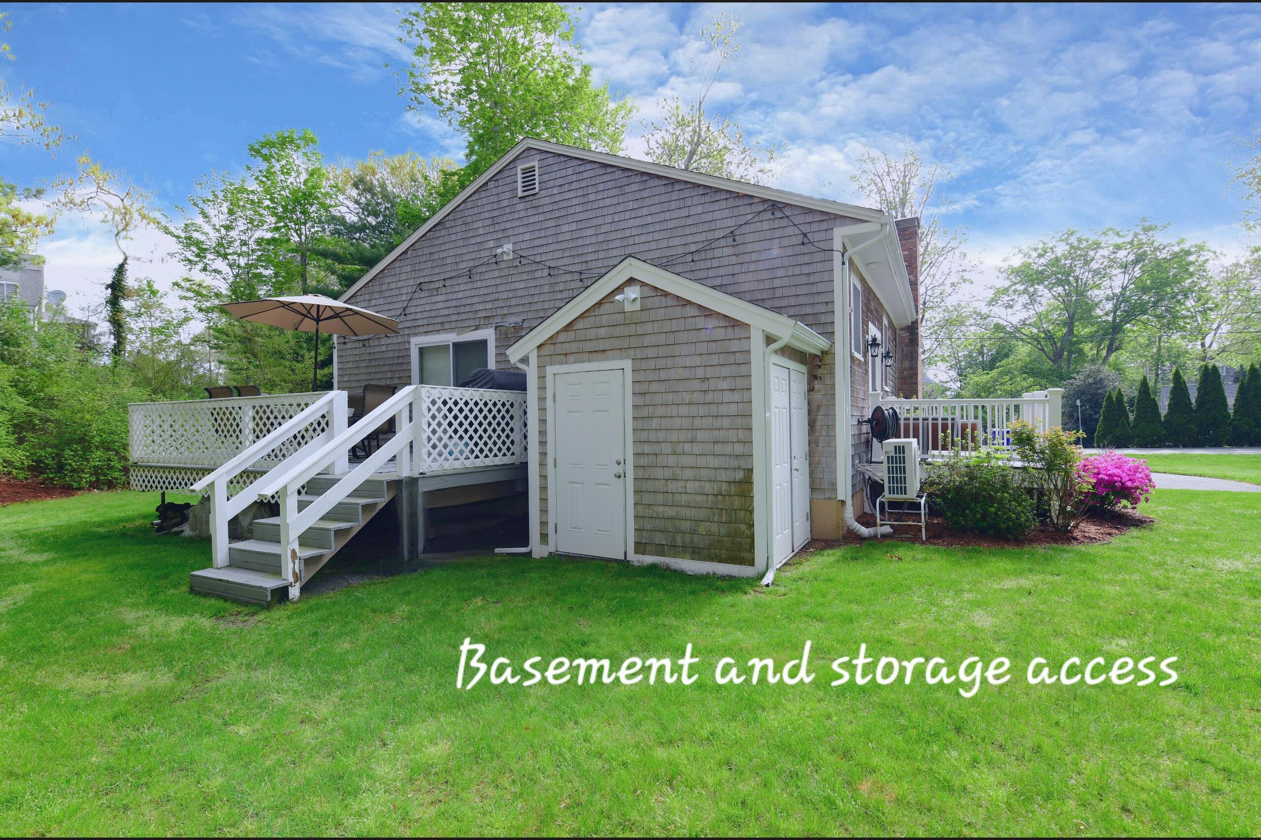 173 Standish Road Sagamore Beach, MA 02562 - Photo 32 of 39 a view of a house with a yard porch and sitting area