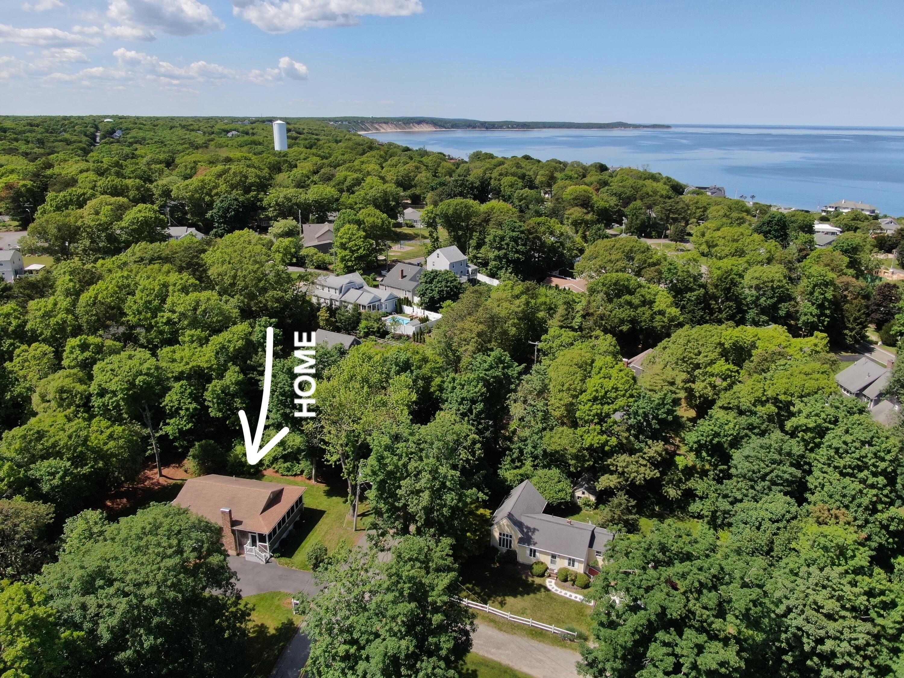 173 Standish Road Sagamore Beach, MA 02562 - Photo 35 of 39 an aerial view of a house with a yard