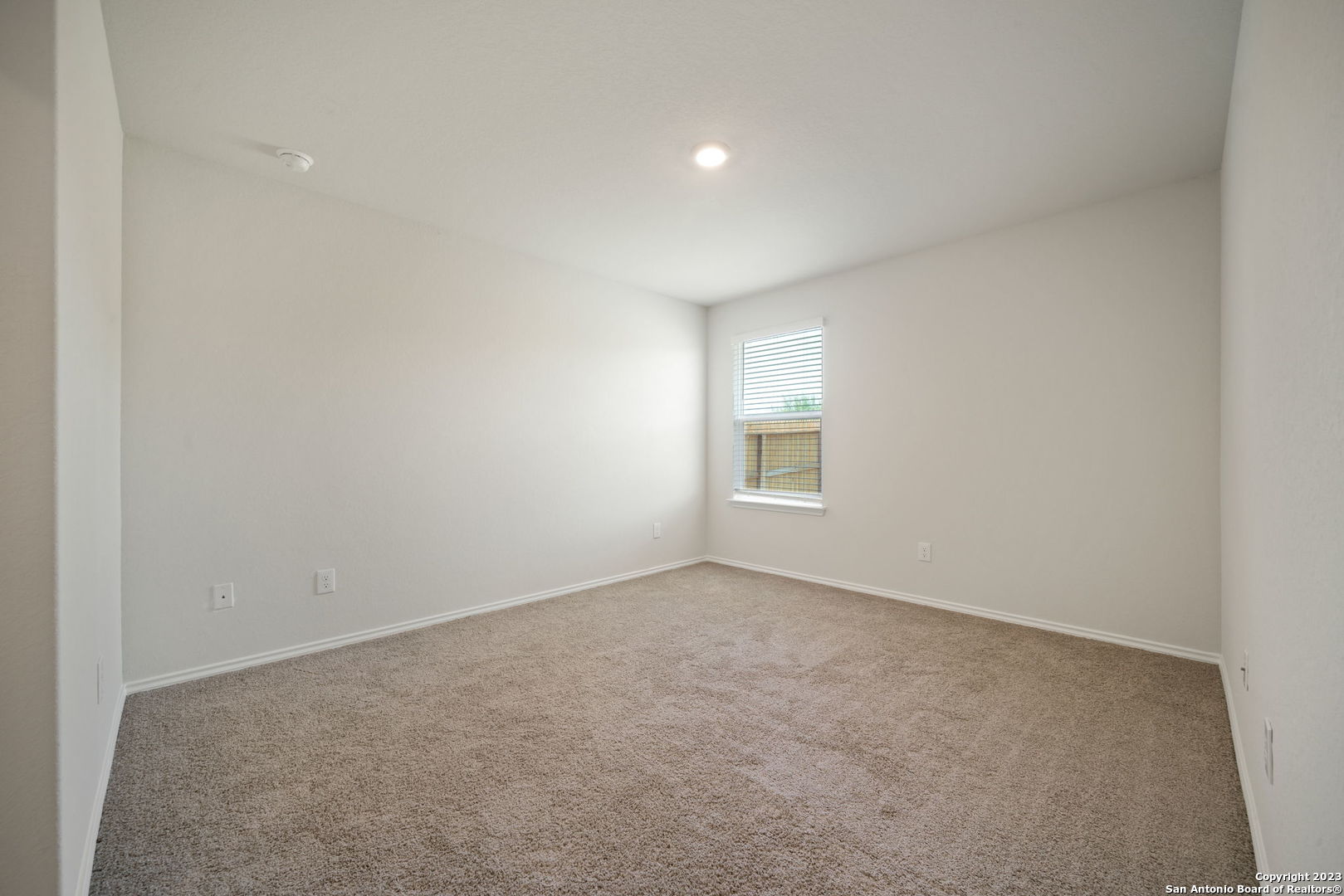 5830 Kendall Prairie Converse, TX 78109 - Photo 14 of 25 an empty room with a window