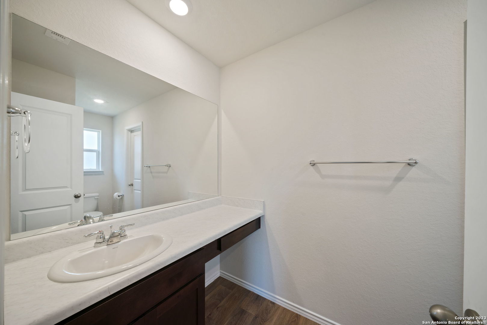 5830 Kendall Prairie Converse, TX 78109 - Photo 17 of 25 a bathroom with a sink and a mirror