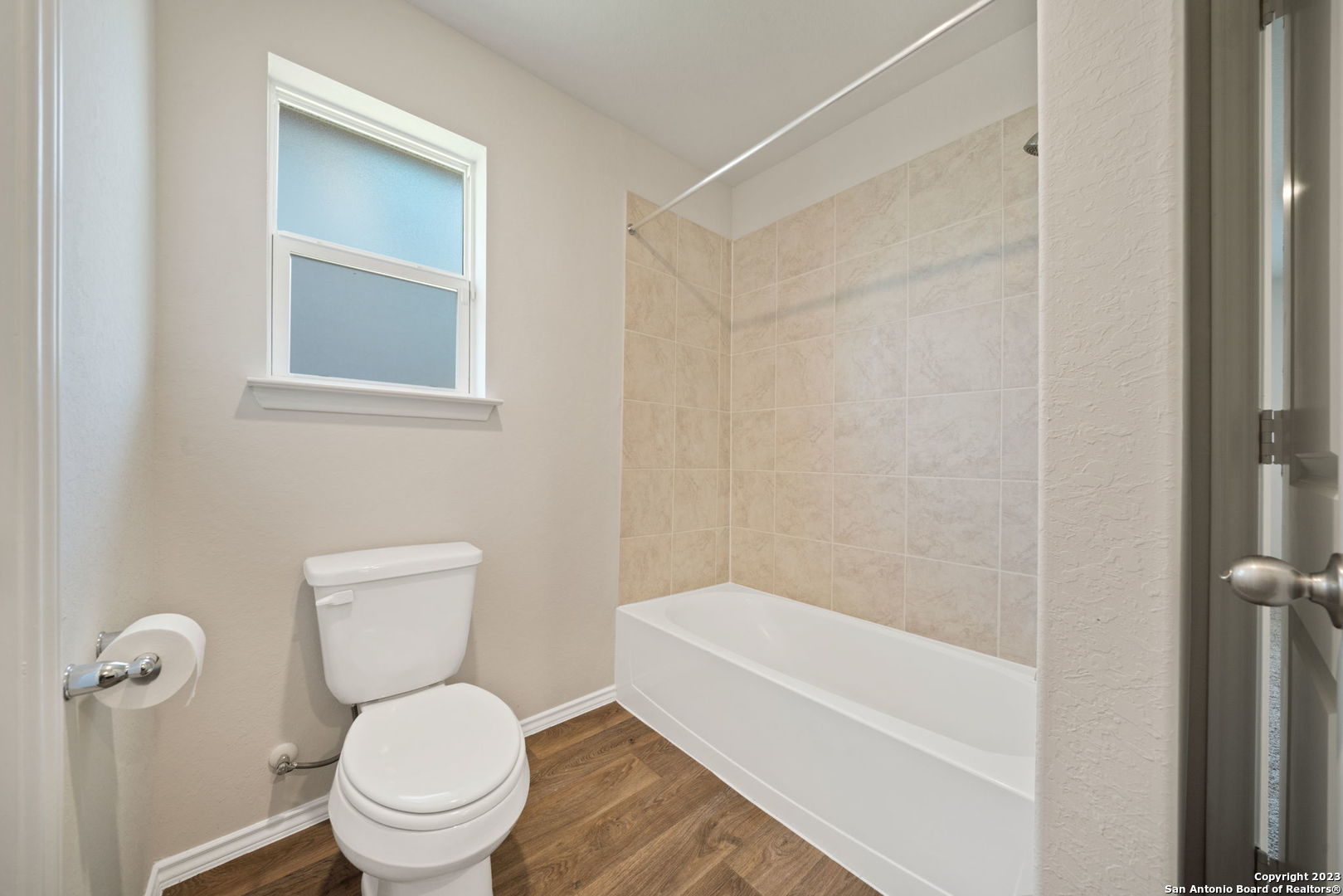 5830 Kendall Prairie Converse, TX 78109 - Photo 18 of 25 a white toilet sitting next to a bath tub