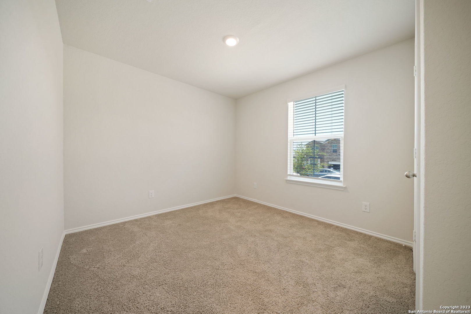 5830 Kendall Prairie Converse, TX 78109 - Photo 21 of 25 an empty room with windows