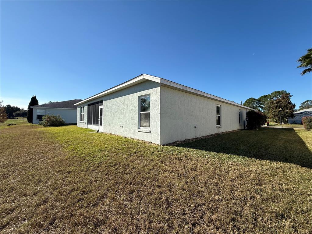 15425 Southwest 14th Avenue Road Ocala, FL 34473 - Photo 20 of 21 a house view with a backyard space