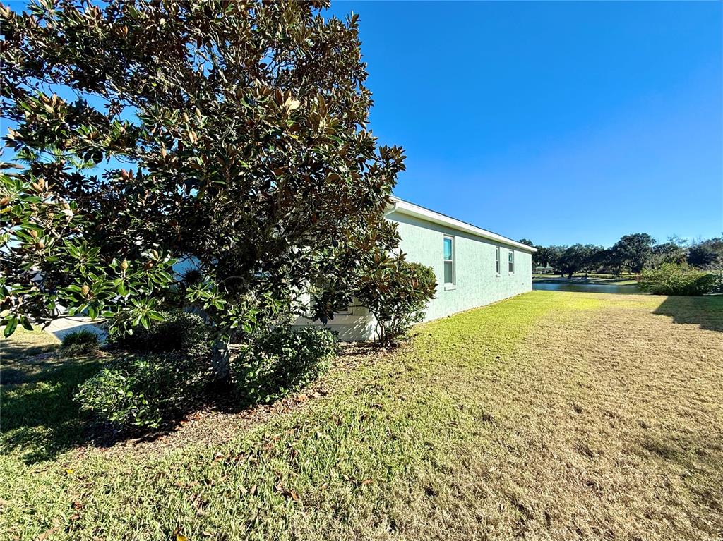 15425 Southwest 14th Avenue Road Ocala, FL 34473 - Photo 5 of 21 a view of an outdoor space and a yard