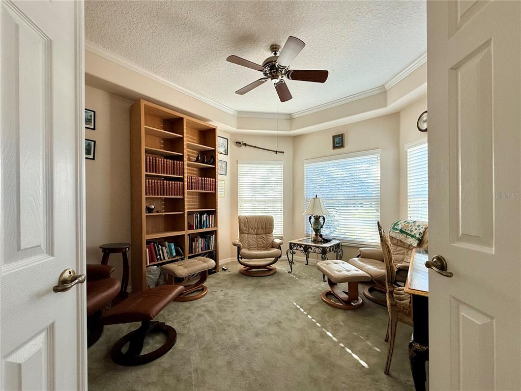 15425 Southwest 14th Avenue Road Ocala, FL 34473 - Photo 8 of 21 a living room with furniture and a large window