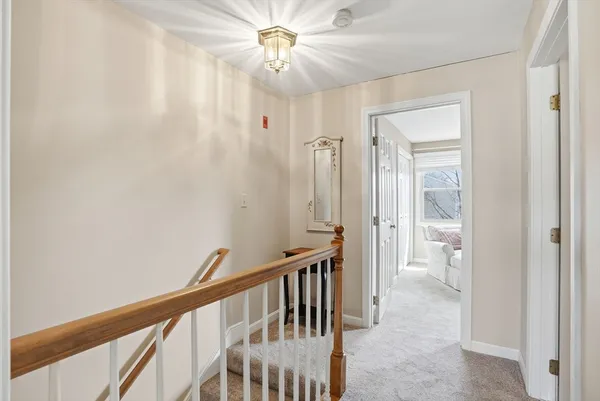 a room with gym equipment and white walls