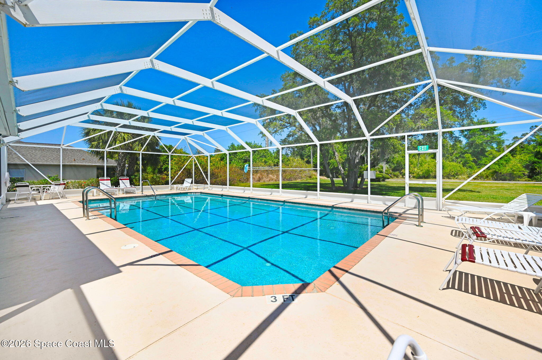 2186 Spring Creek Circle Palm Bay, FL 32905 - Photo 37 of 40 a view of a swimming pool with a patio