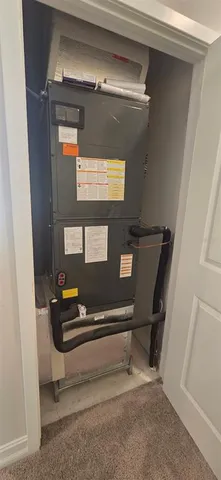 a room with wooden floor and furniture