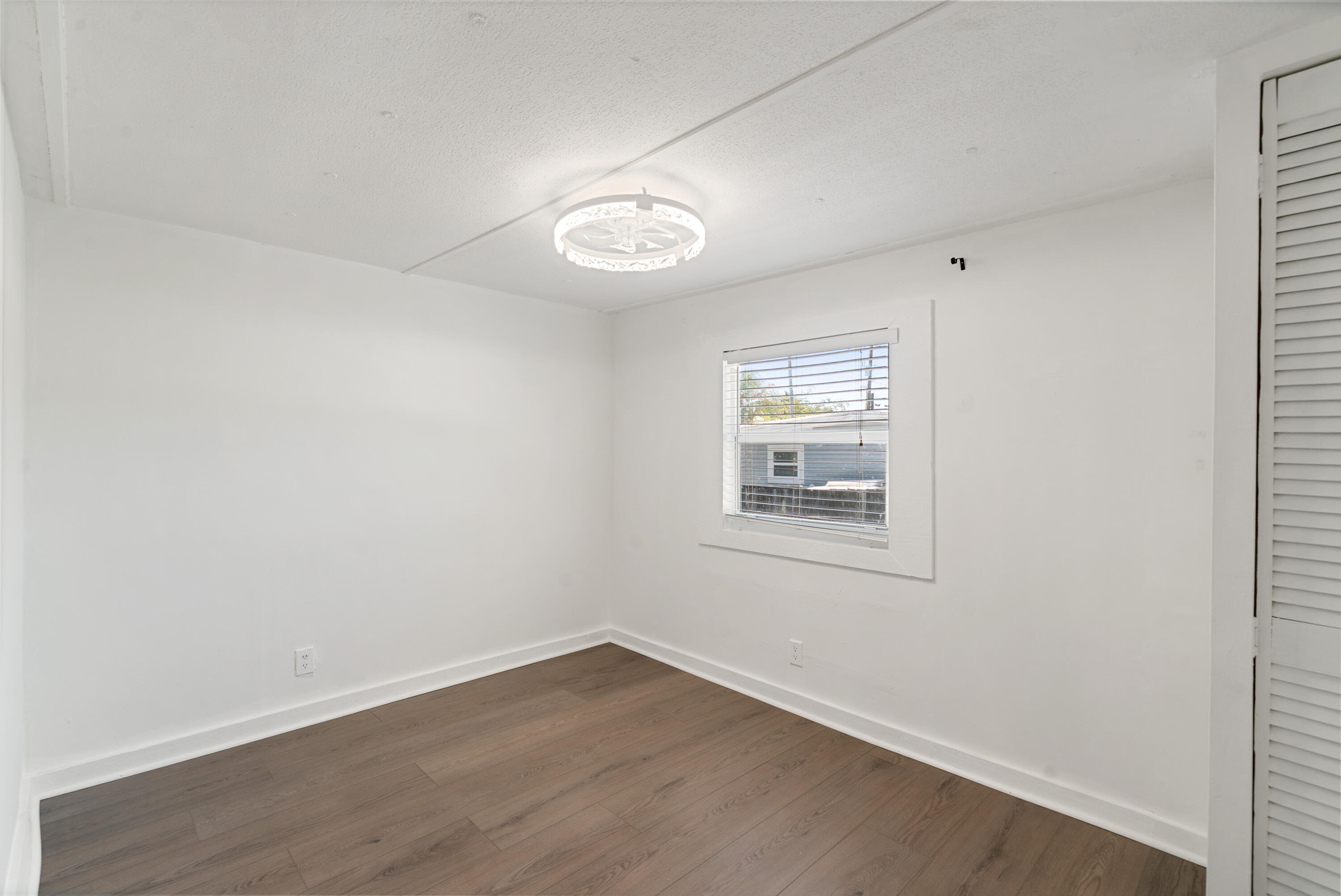 271 Ryan Avenue Key Largo, FL 33037 - Photo 12 of 58 an empty room with a window
