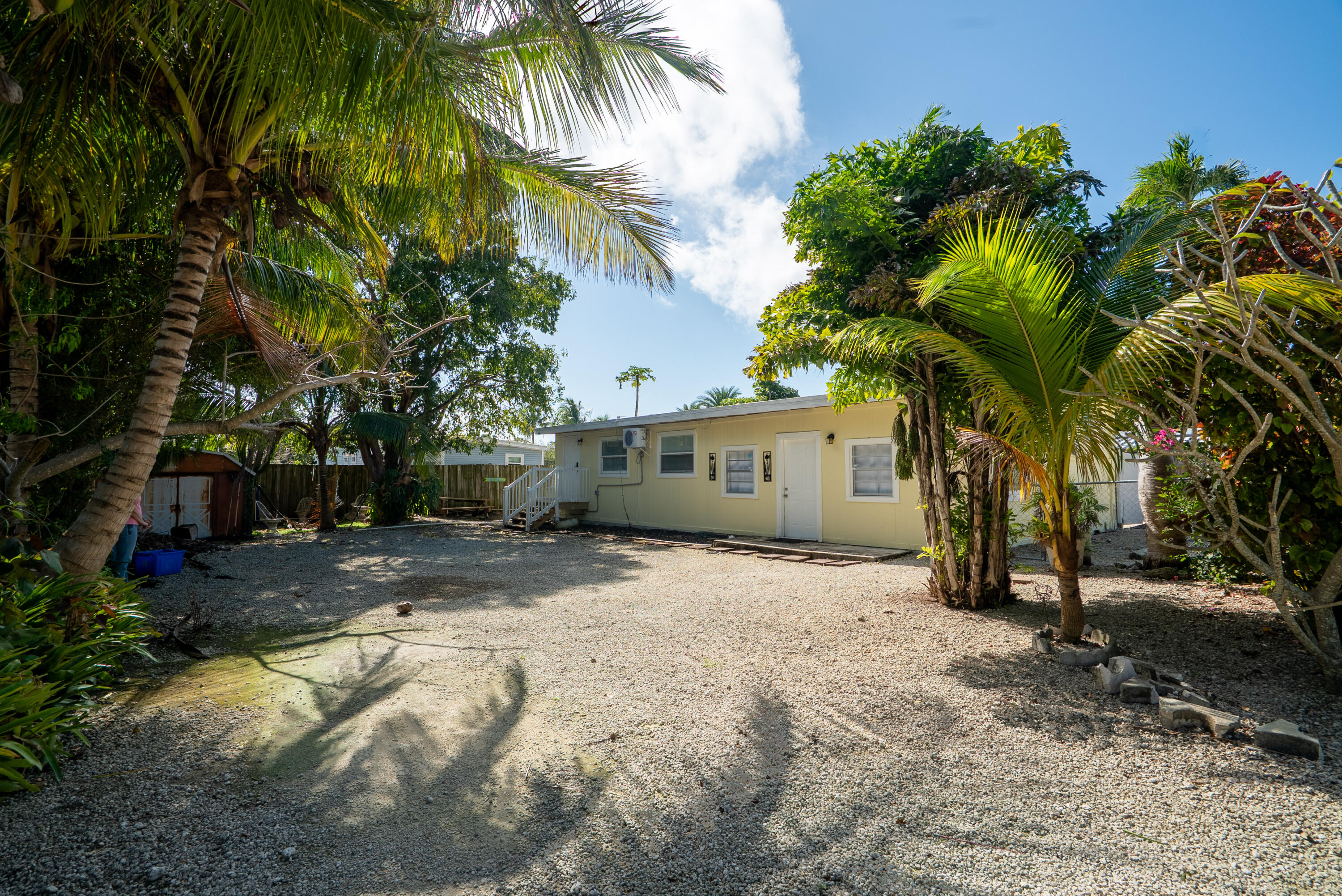 271 Ryan Avenue Key Largo, FL 33037 - Photo 20 of 58 a view of a house with a large tree