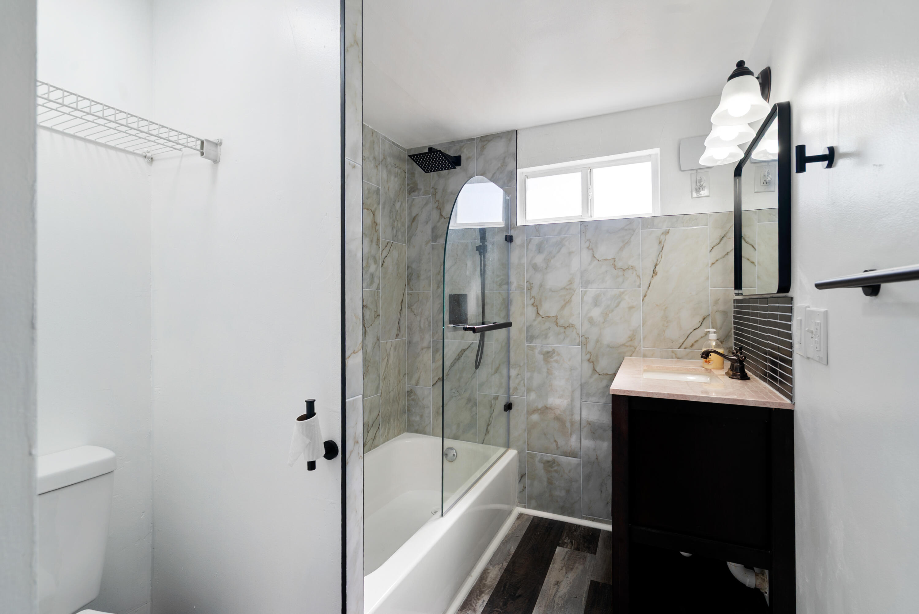 271 Ryan Avenue Key Largo, FL 33037 - Photo 28 of 58 a bathroom with a sink a mirror and a bathtub