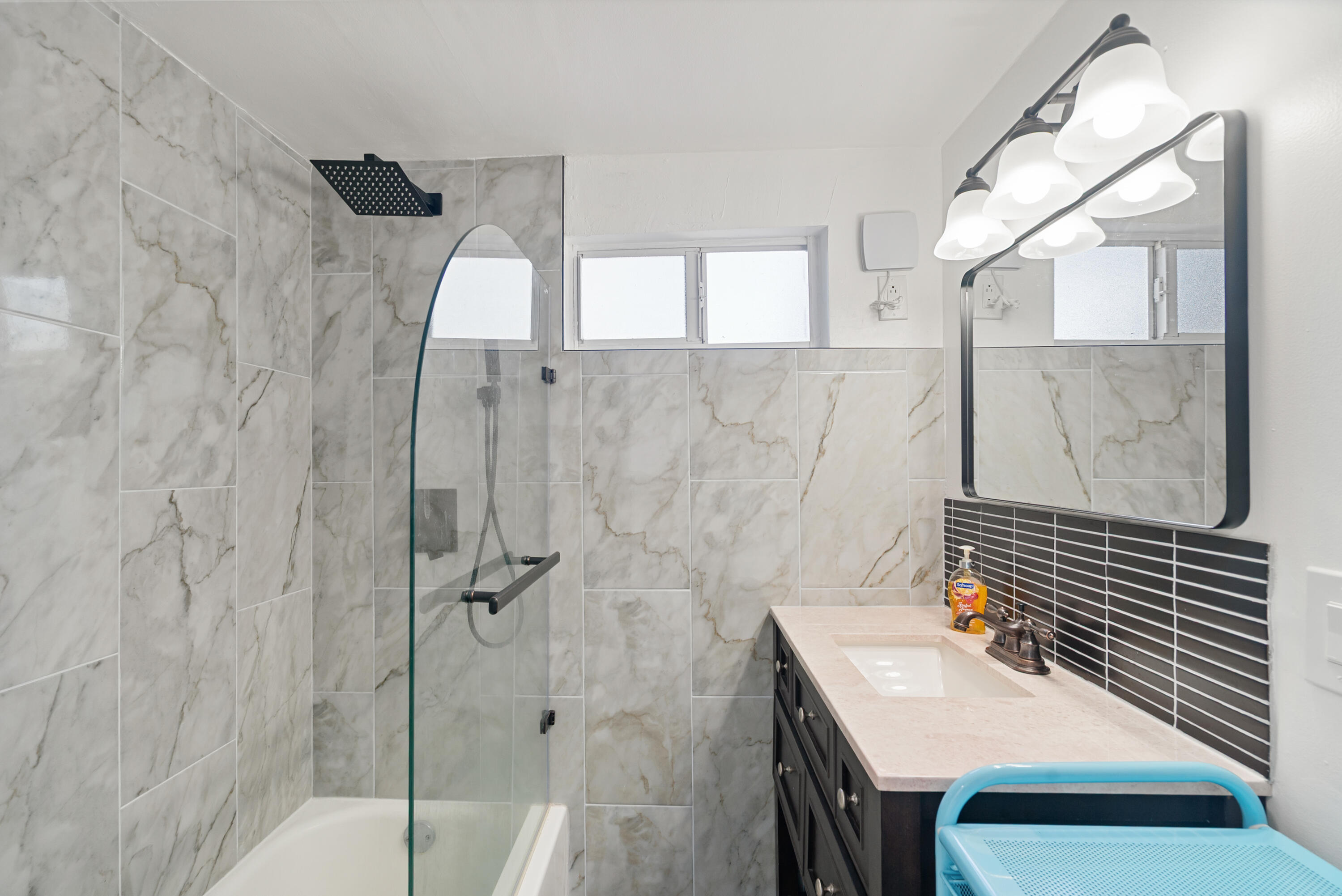 271 Ryan Avenue Key Largo, FL 33037 - Photo 34 of 58 a bathroom with a sink a mirror and shower