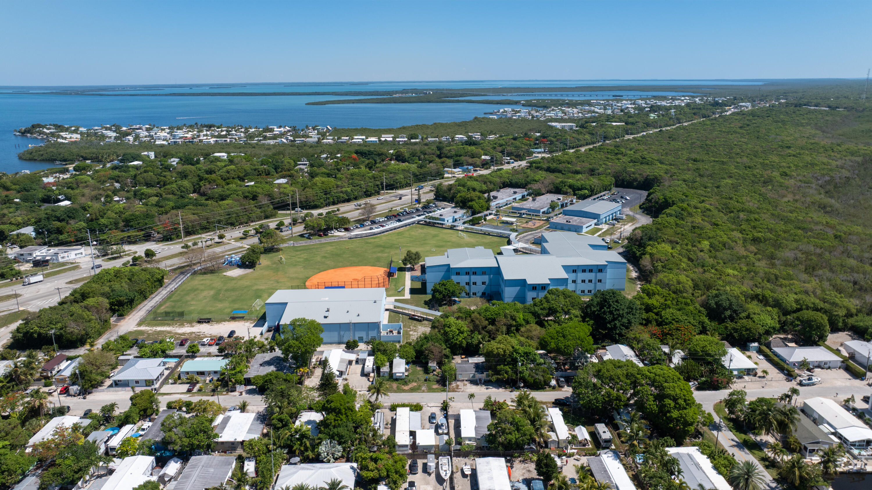 271 Ryan Avenue Key Largo, FL 33037 - Photo 35 of 58 an aerial view of residential building and lake