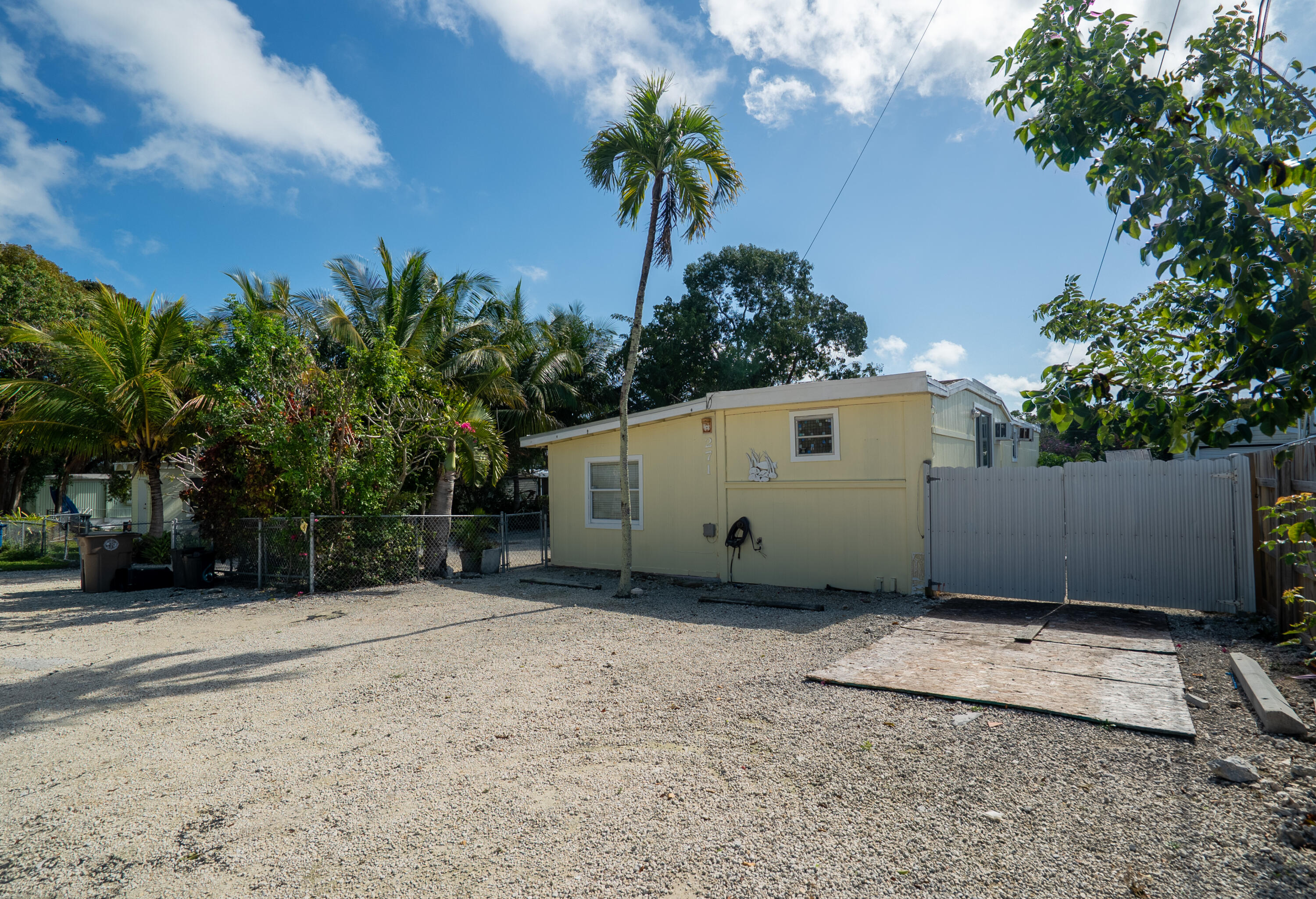 271 Ryan Avenue Key Largo, FL 33037 - Photo 37 of 58 a view of a house with a yard