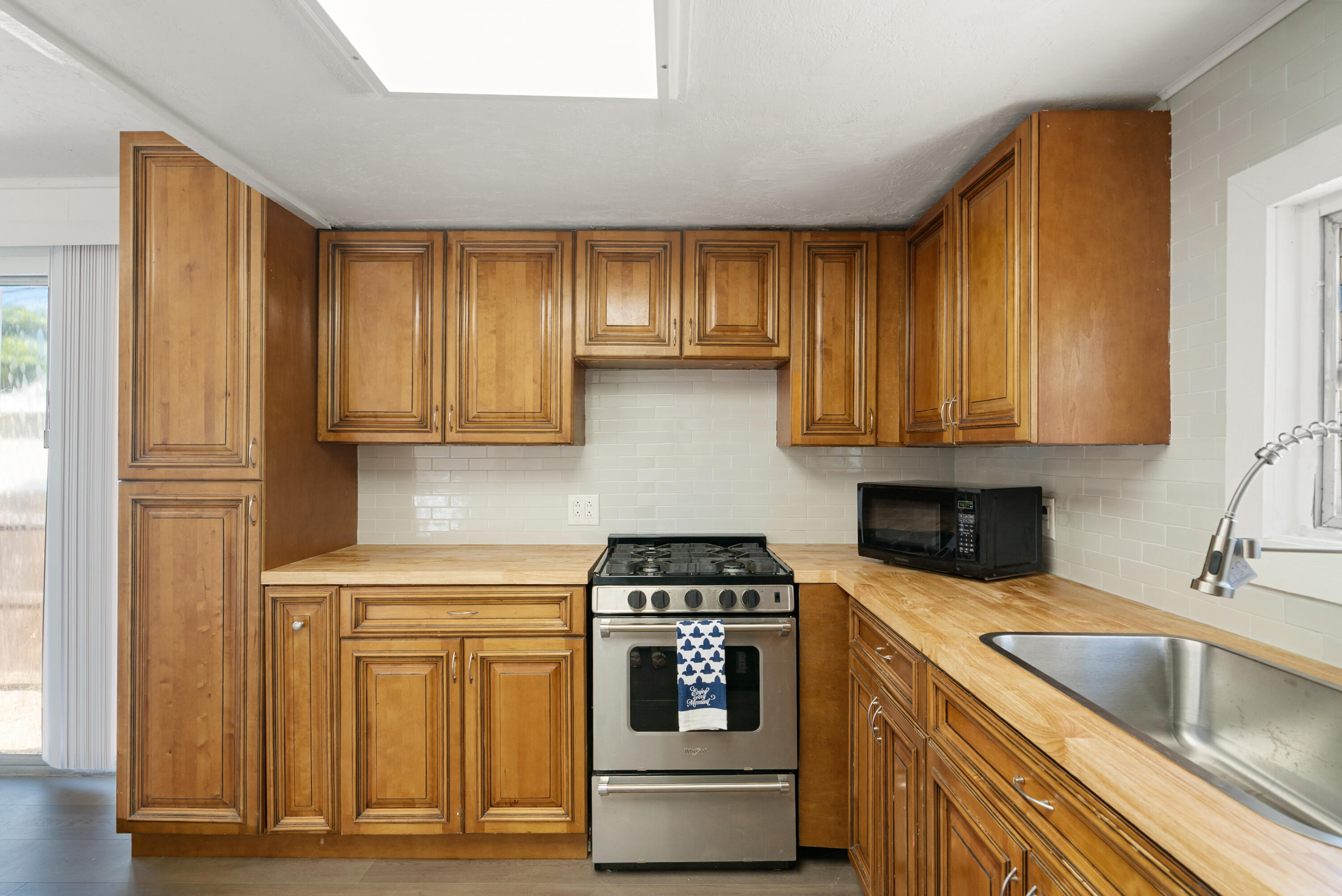 271 Ryan Avenue Key Largo, FL 33037 - Photo 4 of 58 a kitchen with a sink and a stove top oven