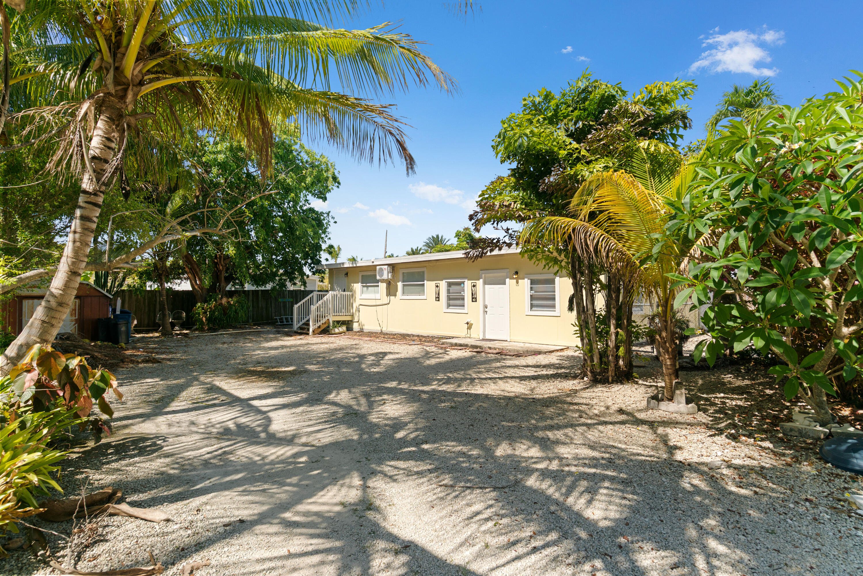 271 Ryan Avenue Key Largo, FL 33037 - Photo 42 of 58 a view of a house with a tree