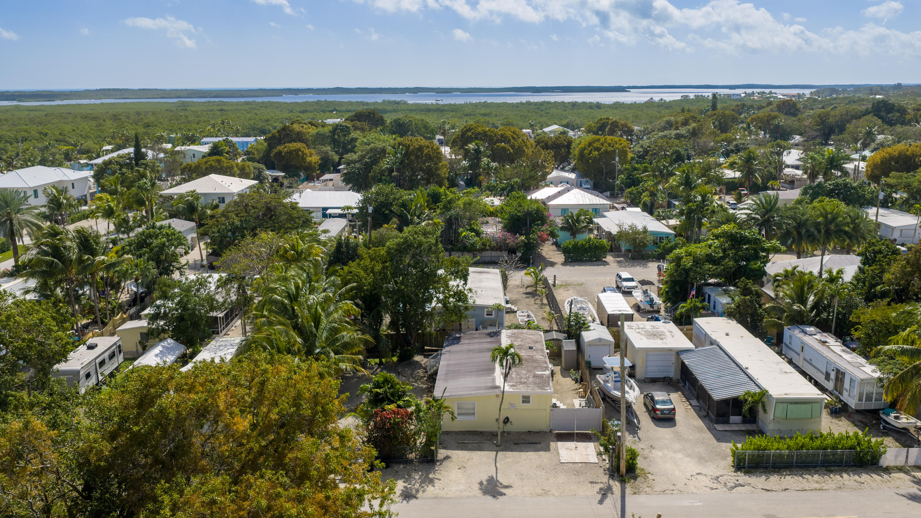 271 Ryan Avenue Key Largo, FL 33037 - Photo 45 of 58 an aerial view of residential houses with outdoor space and trees