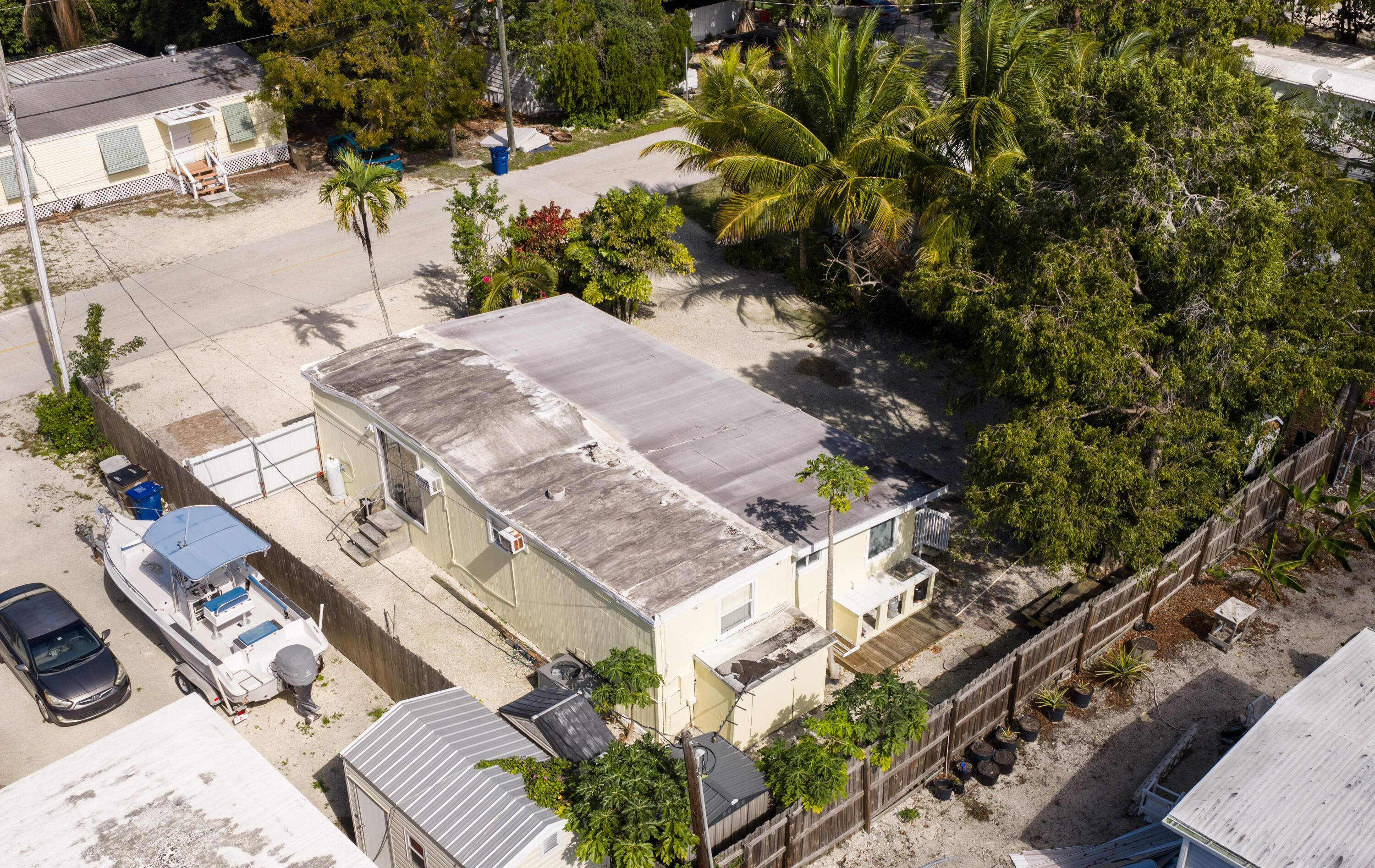 271 Ryan Avenue Key Largo, FL 33037 - Photo 52 of 58 an aerial view of a house with a yard and lake view