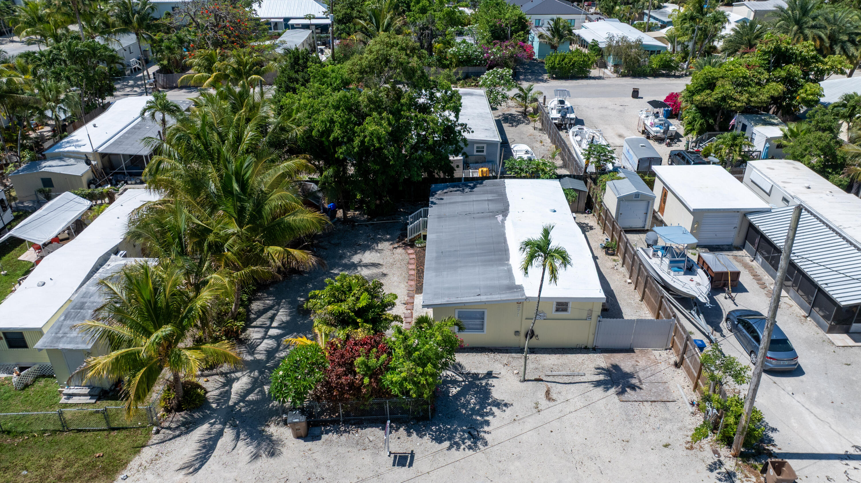 271 Ryan Avenue Key Largo, FL 33037 - Photo 53 of 58 an aerial view of a house with a yard and furniture