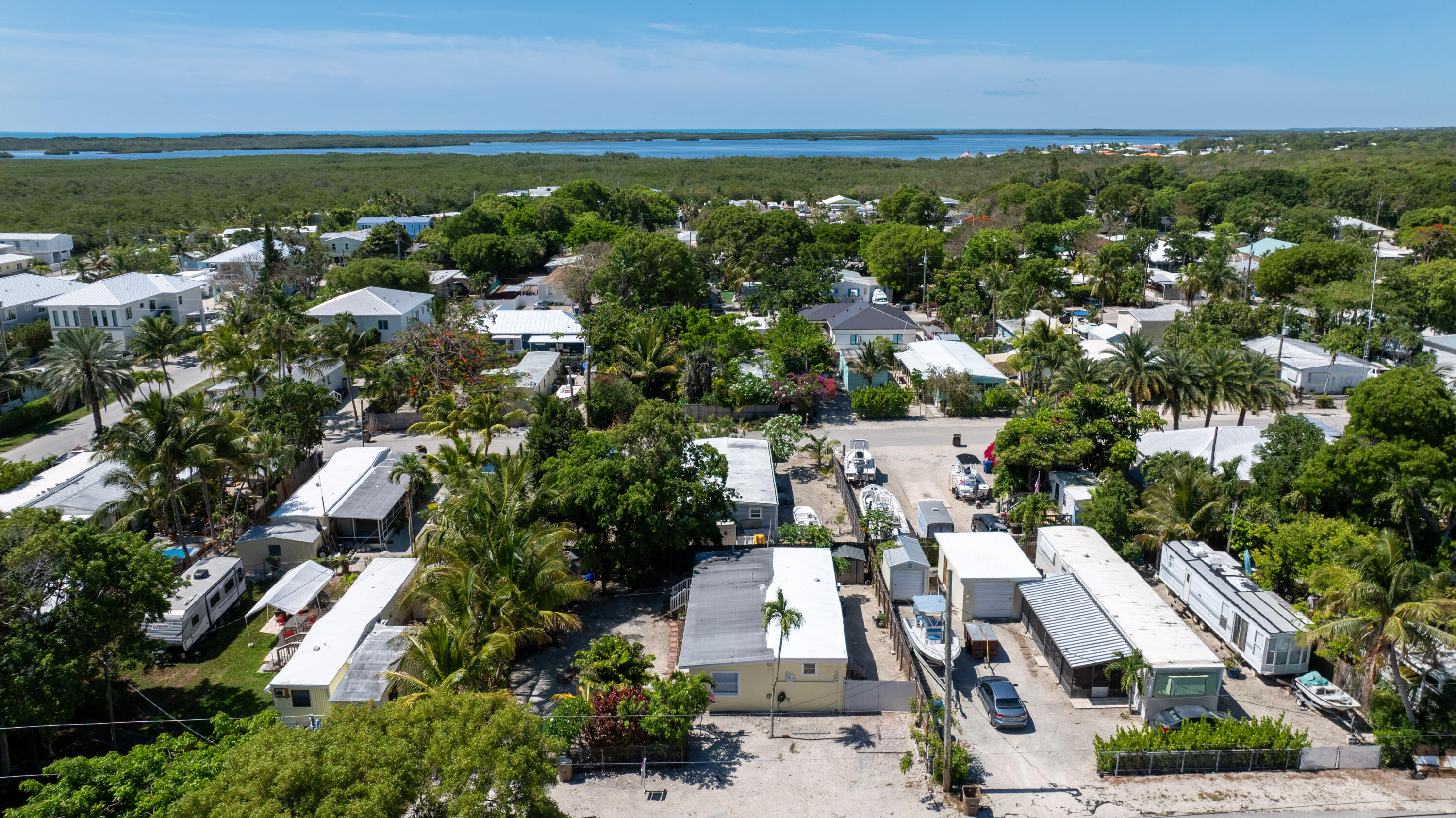 271 Ryan Avenue Key Largo, FL 33037 - Photo 54 of 58 an aerial view of residential houses with outdoor space and trees
