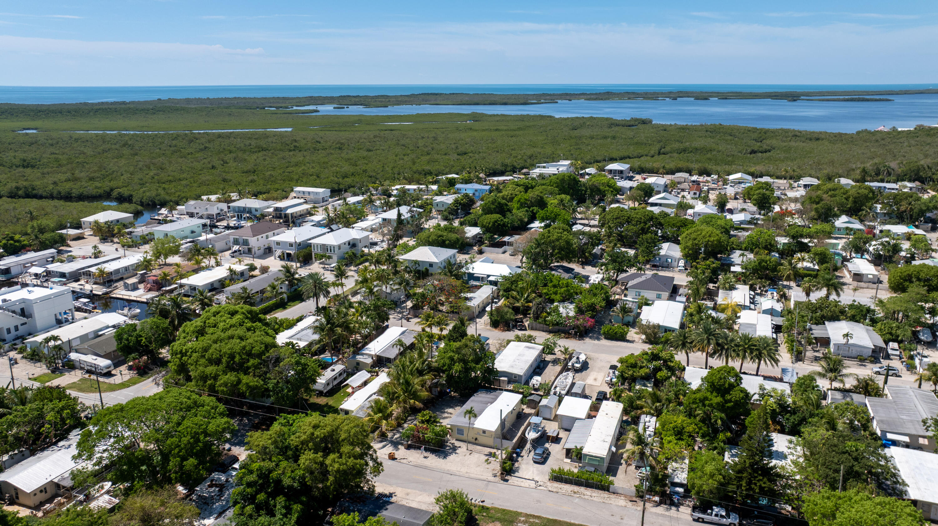 271 Ryan Avenue Key Largo, FL 33037 - Photo 55 of 58 a view of a city with an ocean