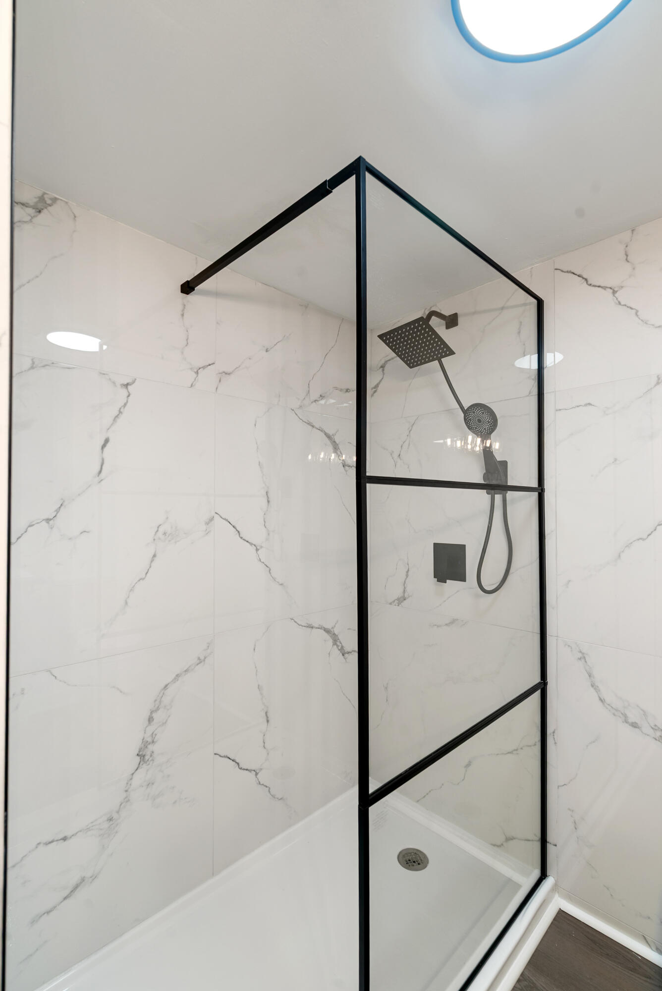 271 Ryan Avenue Key Largo, FL 33037 - Photo 8 of 58 a bathroom with a glass shower door and a shower