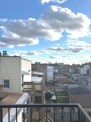 a view of city from a balcony