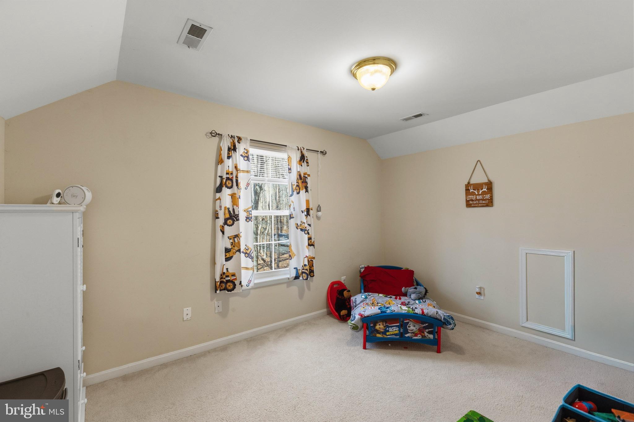9279 Inaugural Drive King George, VA 22485 - Photo 21 of 30 a bedroom with furniture and a window