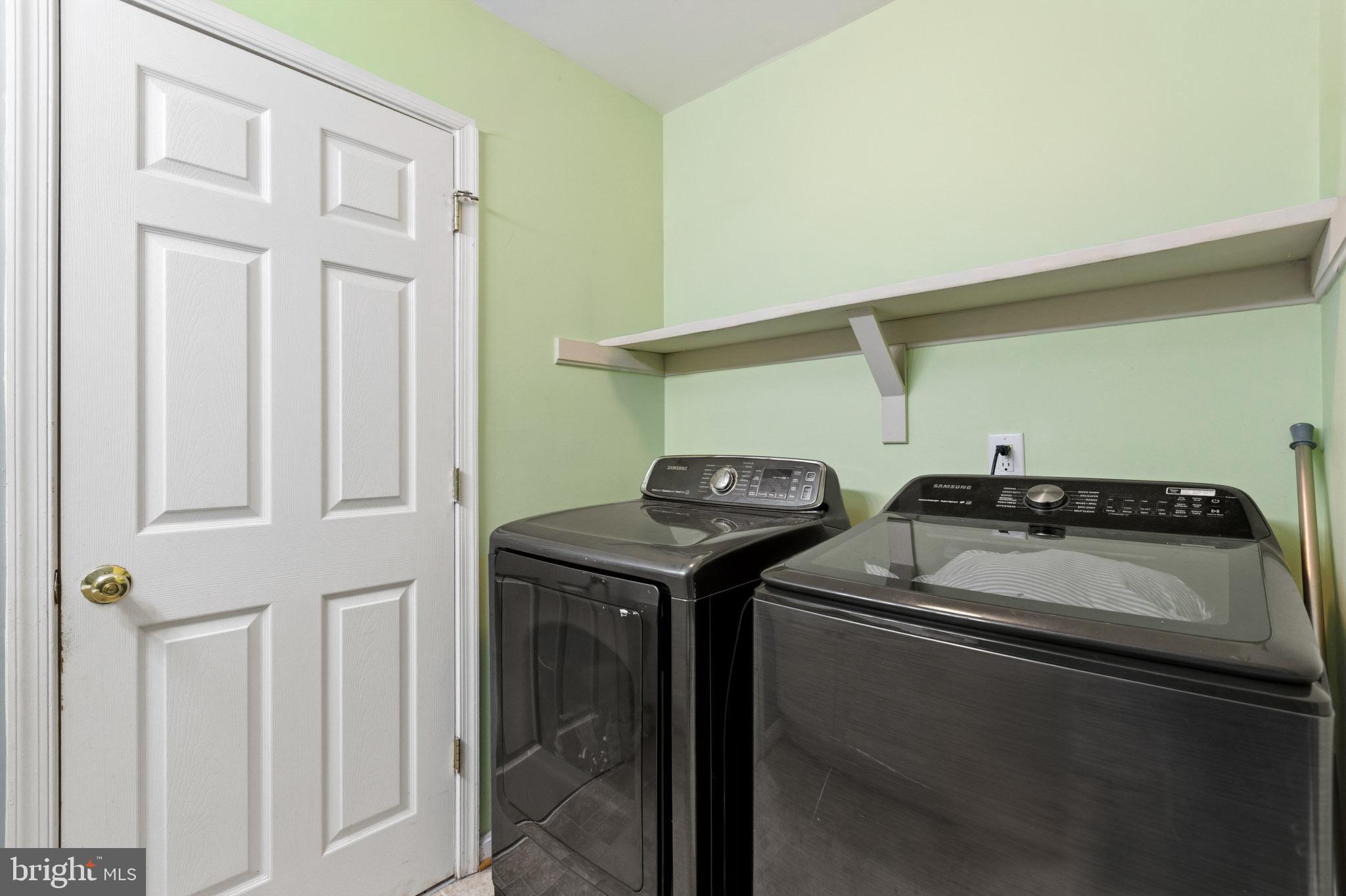 9279 Inaugural Drive King George, VA 22485 - Photo 24 of 30 a utility room with dryer and washer