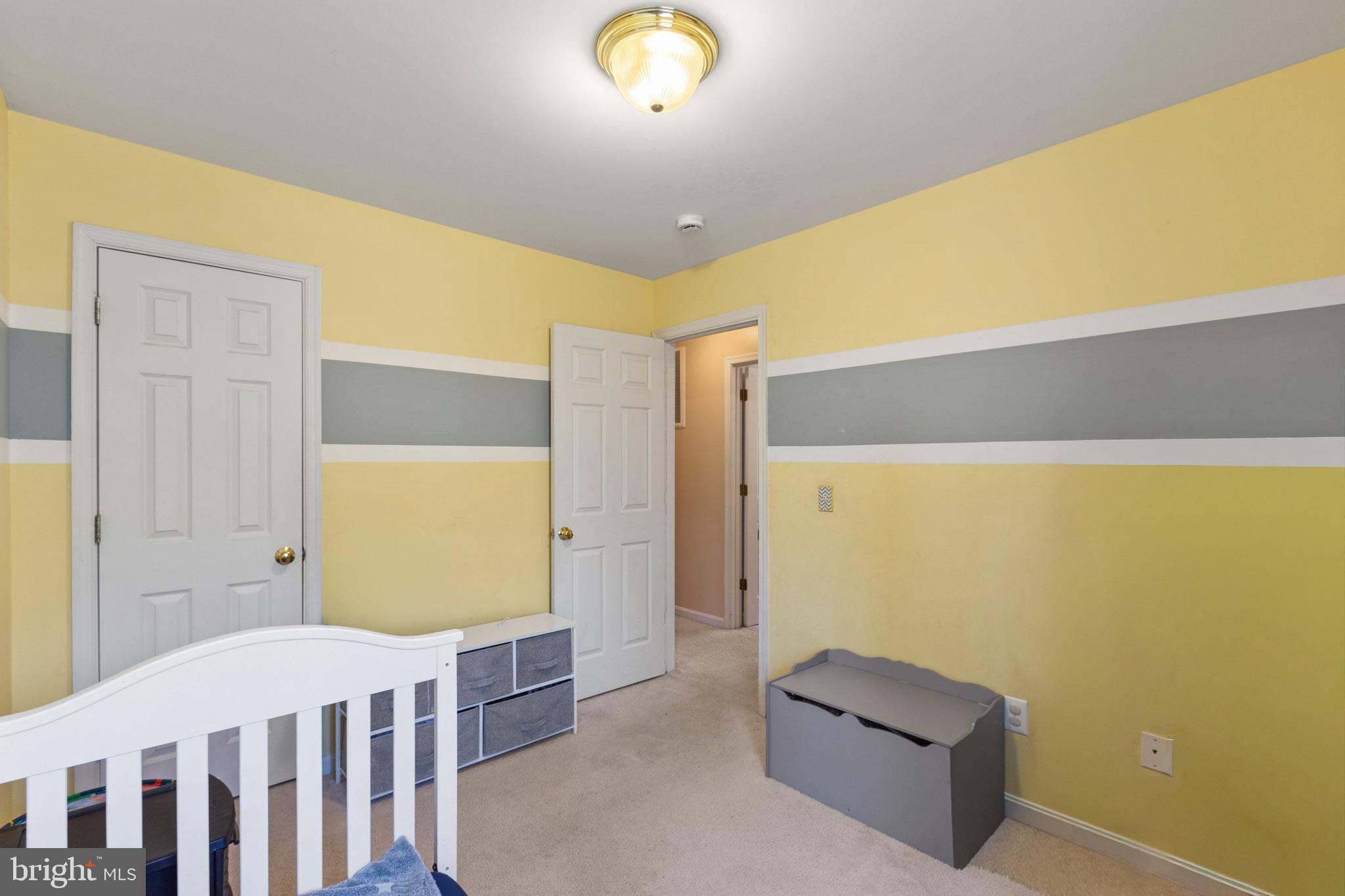 9279 Inaugural Drive King George, VA 22485 - Photo 26 of 30 a bedroom with a bed and teddy