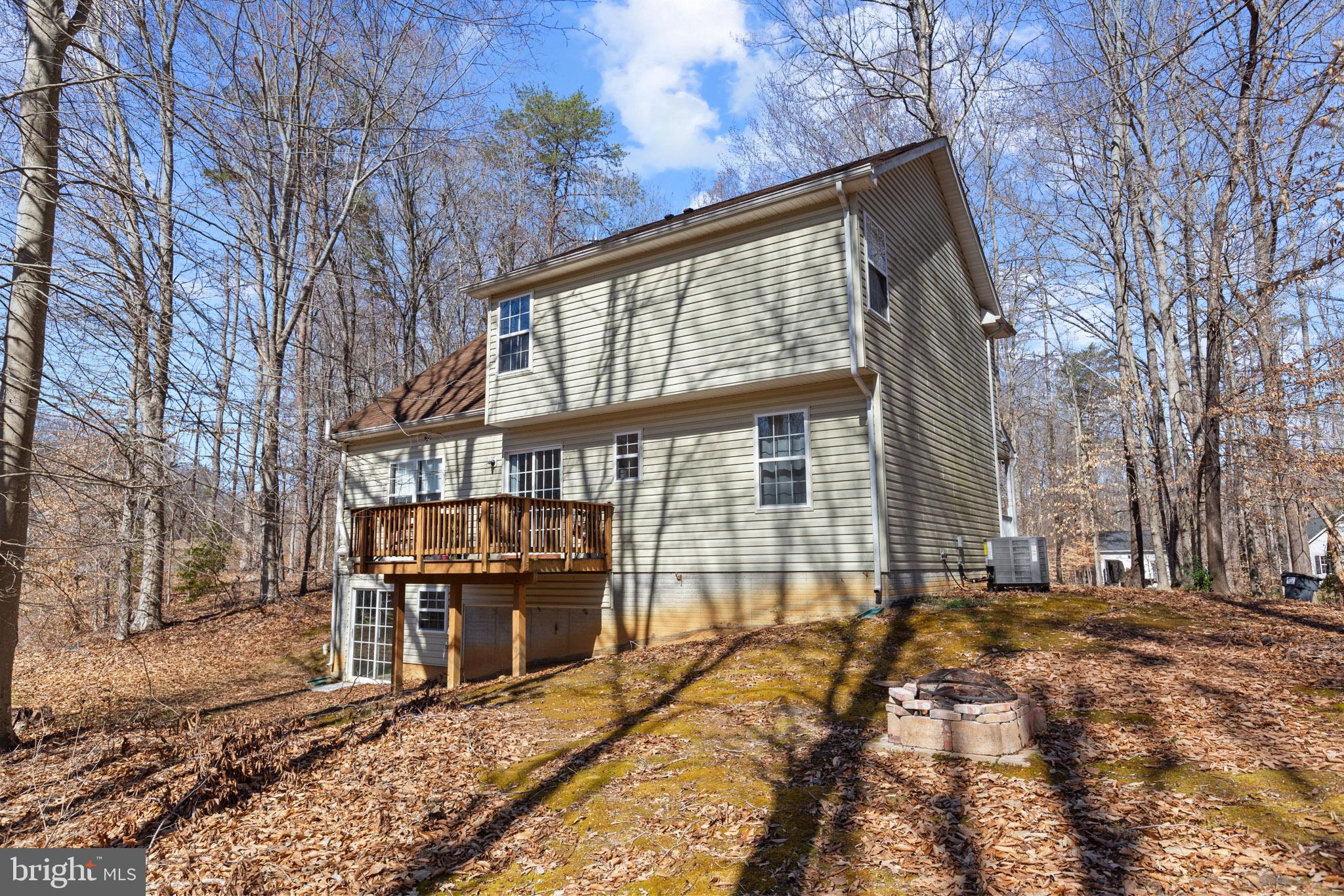 9279 Inaugural Drive King George, VA 22485 - Photo 29 of 30 a view of a house with a yard