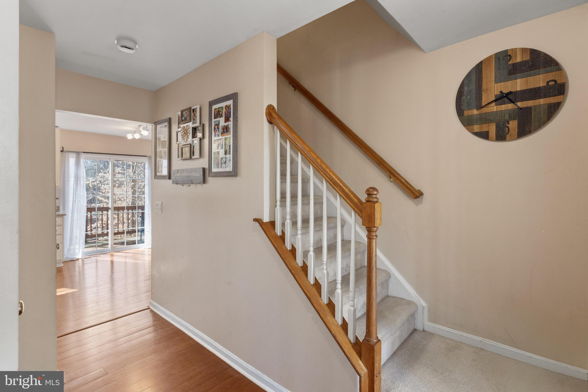 9279 Inaugural Drive King George, VA 22485 - Photo 3 of 30 a view of entryway and hall with wooden floor