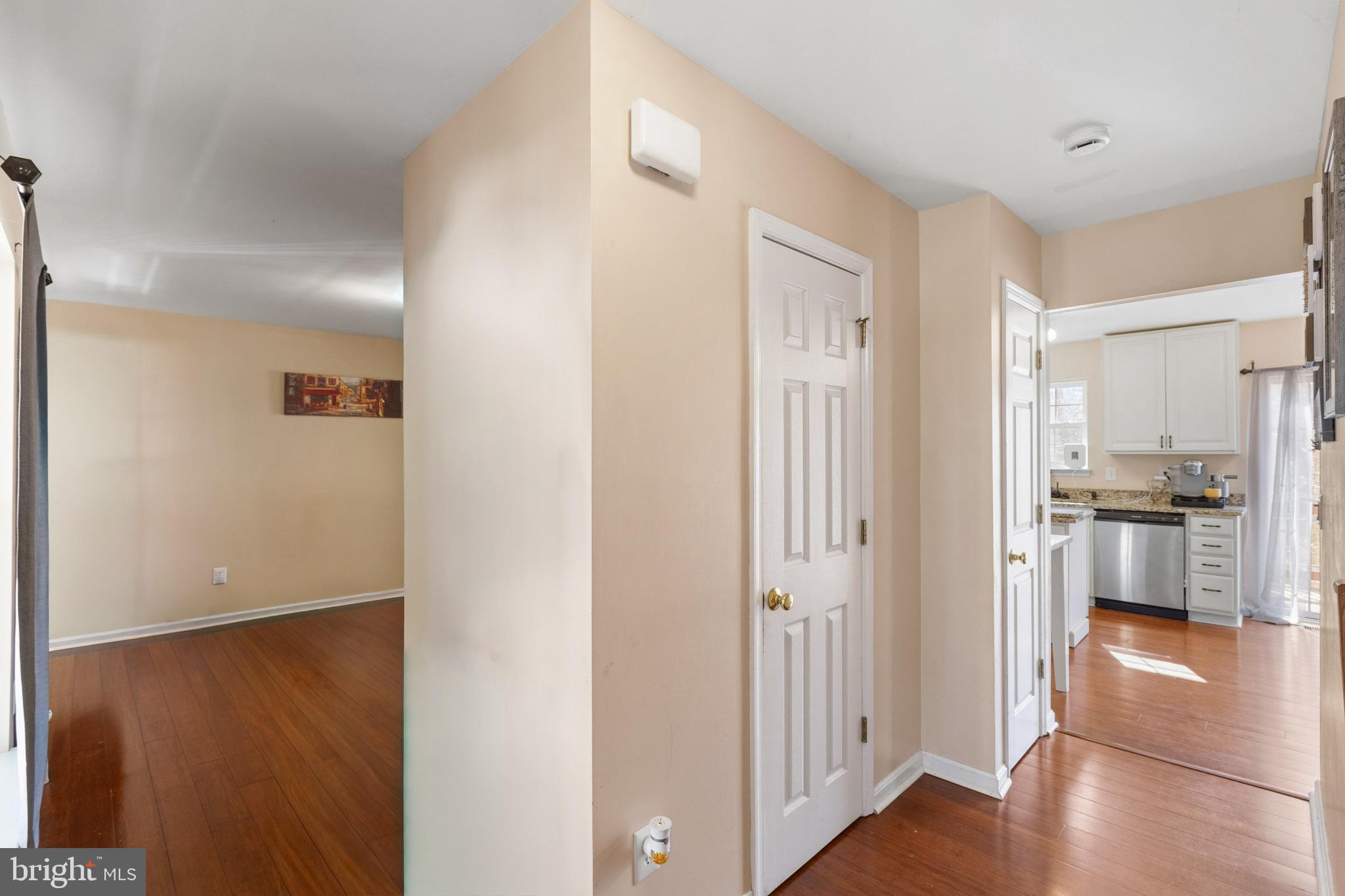 9279 Inaugural Drive King George, VA 22485 - Photo 4 of 30 a view of a hallway with a dining room