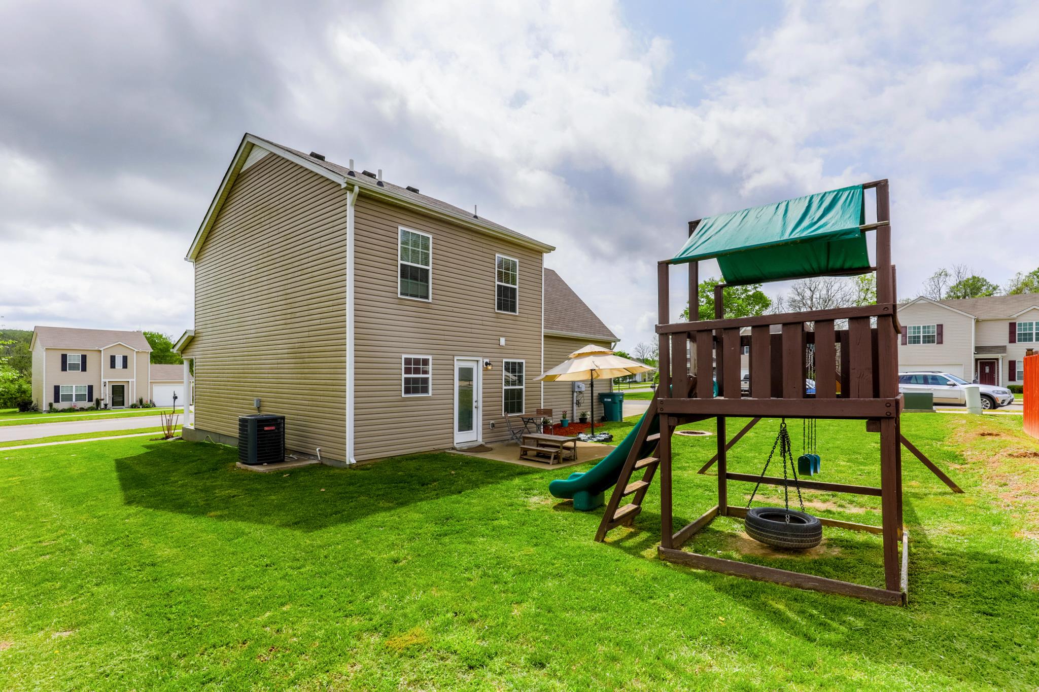 1118 Woodall Road Lebanon, TN 37090 - Photo 25 of 25 a view of backyard with a garden and deck