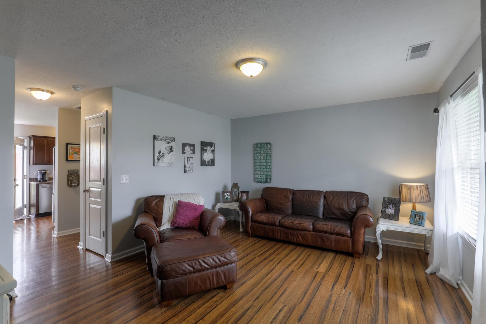 1118 Woodall Road Lebanon, TN 37090 - Photo 5 of 25 a living room with furniture and a wooden floor