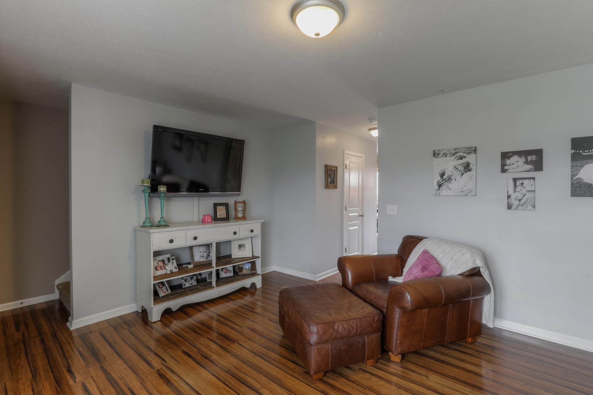 1118 Woodall Road Lebanon, TN 37090 - Photo 7 of 25 a living room with furniture and a flat screen tv