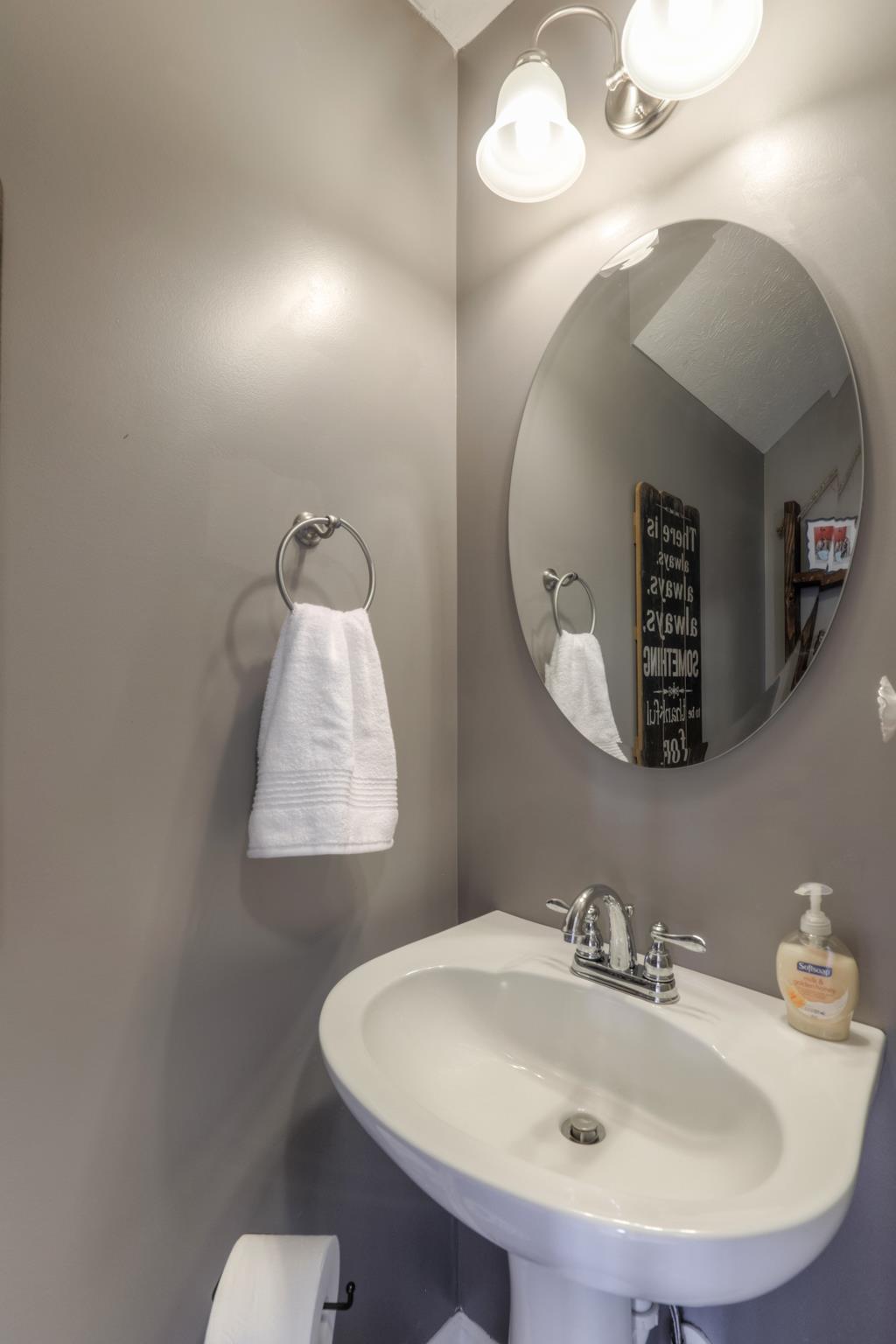 1118 Woodall Road Lebanon, TN 37090 - Photo 8 of 25 a bathroom with a sink and mirror