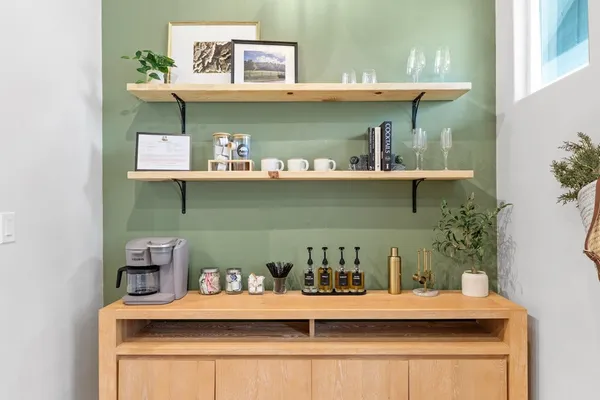 a view of storage and utility room with a sink