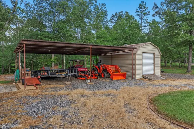 a view of a parked car in front of house