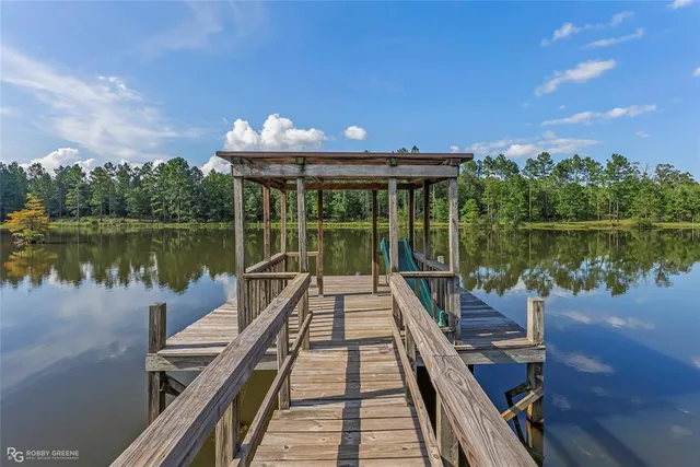 a view of a lake with a deck