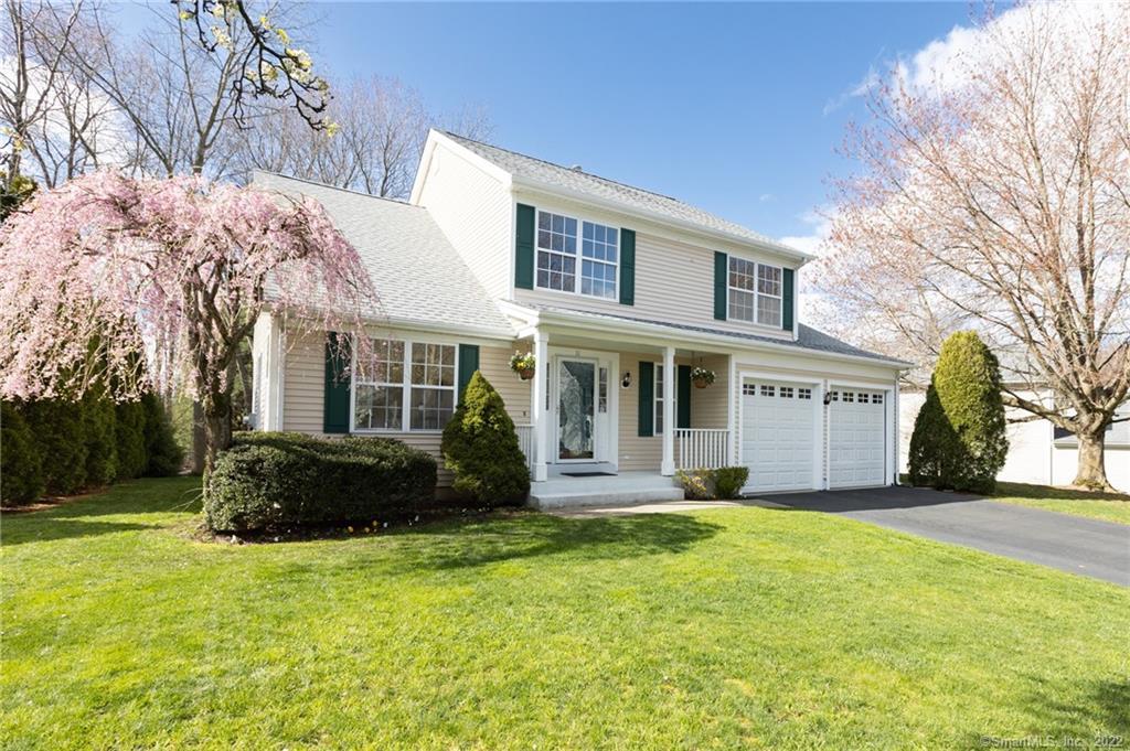 11 Lookout Hill Road Milford, CT 06461 - Photo 1 of 1 a front view of a house with a yard
