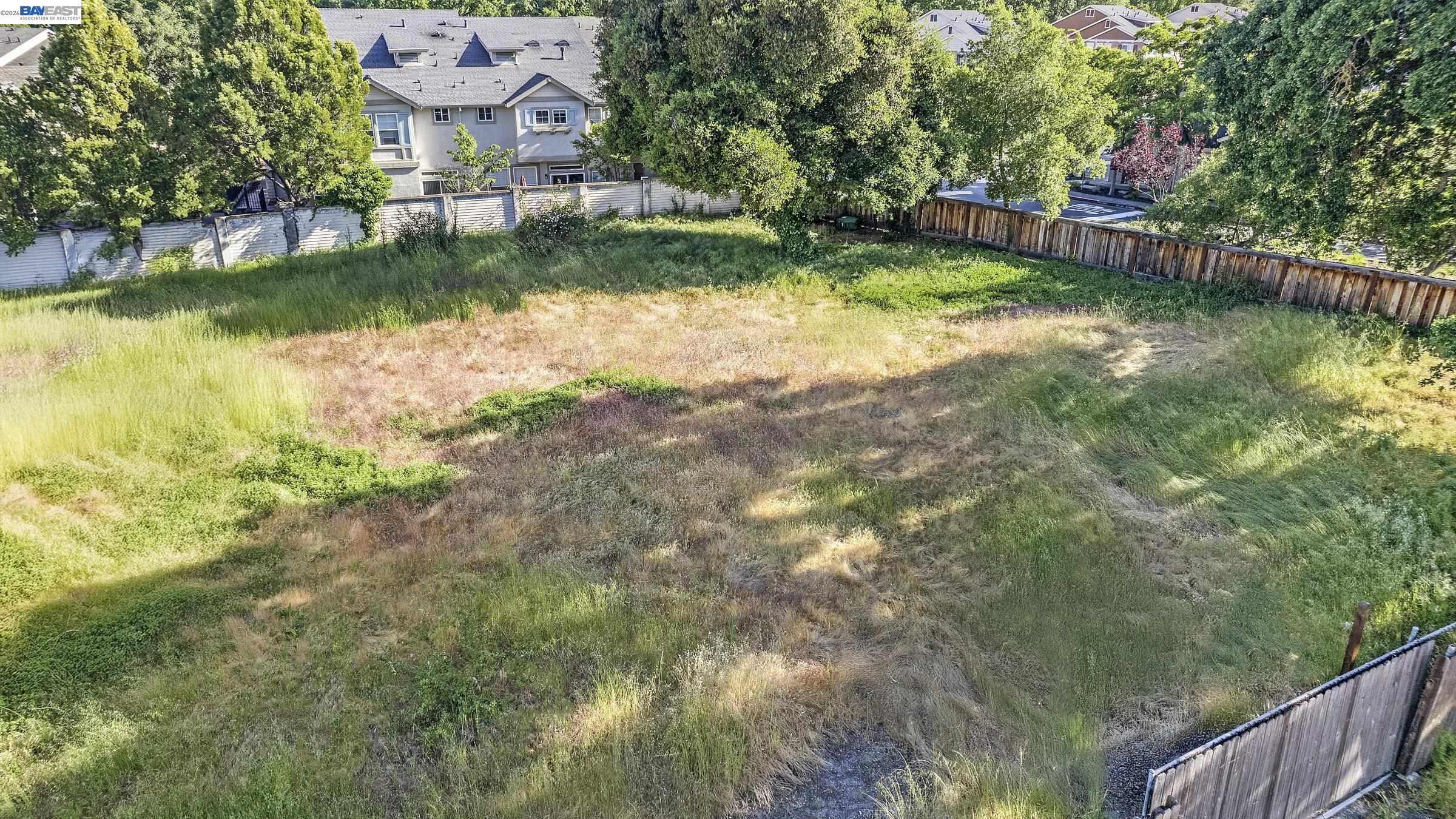 19251 San Ramon Valley Boulevard San Ramon, CA 94583 - Photo 13 of 15 an aerial view of residential houses with outdoor space and lake view