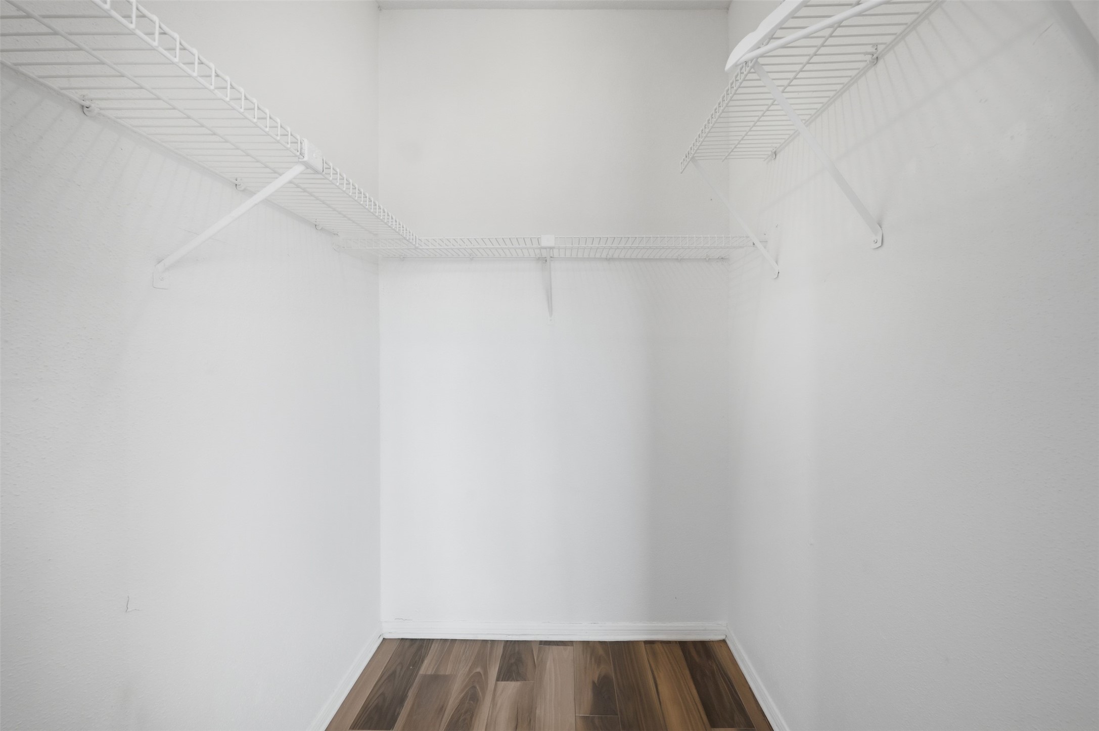 793 Davis Road, Unit 116 League City, TX 77573 - Photo 19 of 31 a view of wooden closet