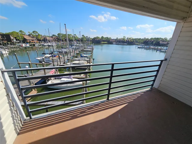 a view of a lake from a balcony