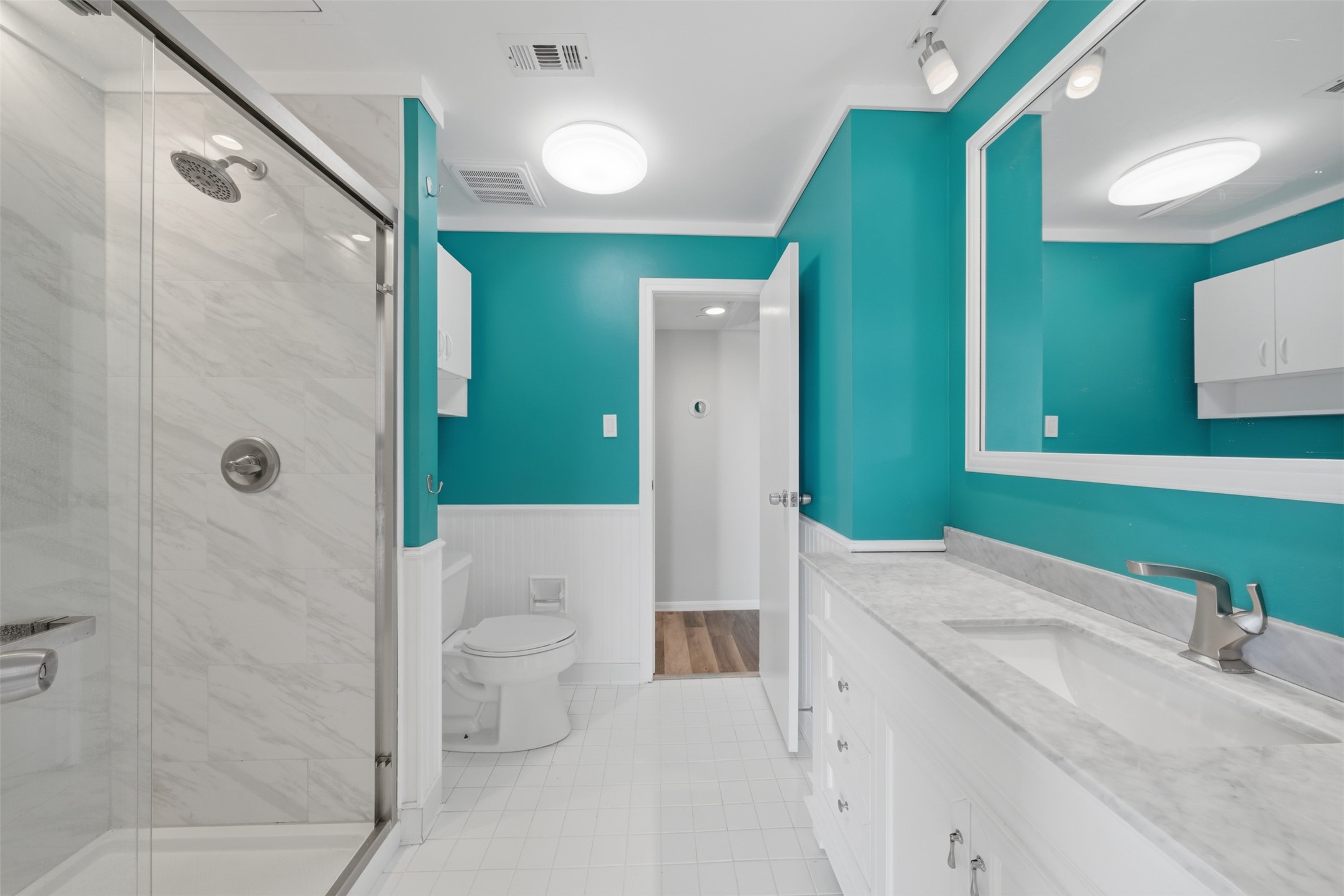 793 Davis Road, Unit 116 League City, TX 77573 - Photo 21 of 31 a bathroom with a sink a toilet and shower